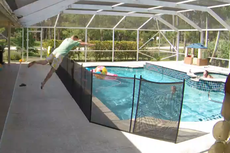 Father jumps over four-foot fence to save one-year-old son from drowning in pool