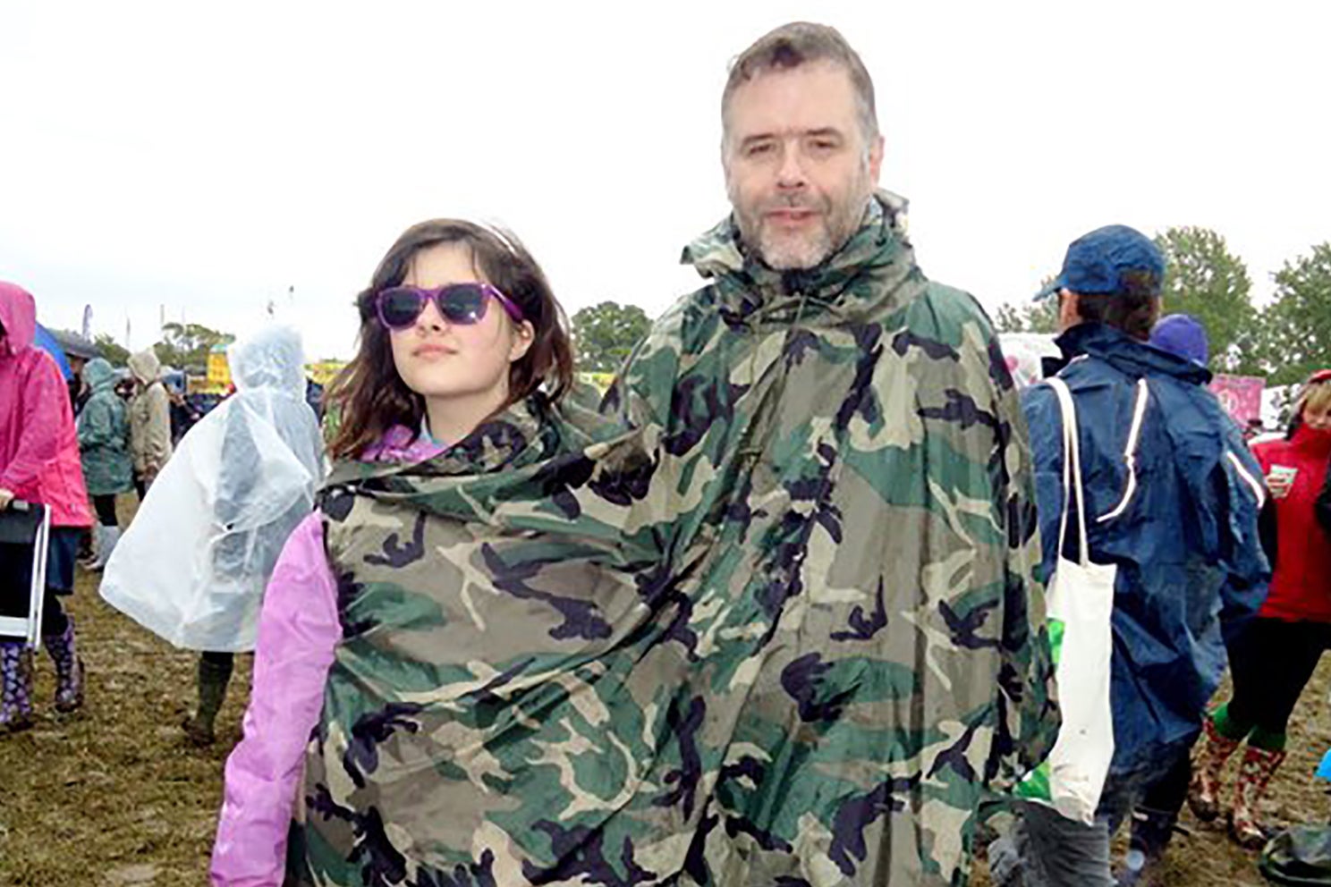 Millicent, aged 11, with her dad at Glastonbury 2011