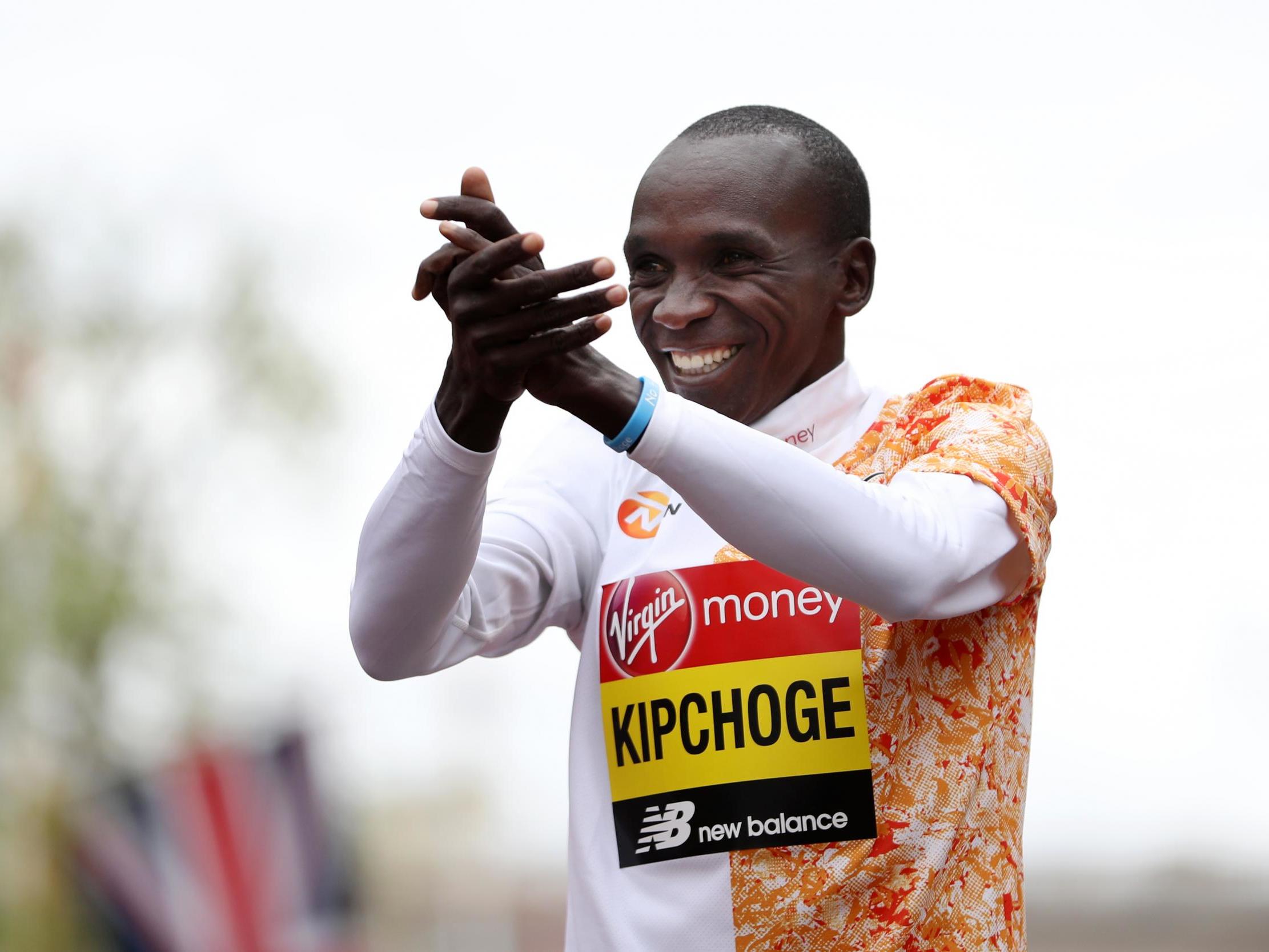 The 34-year-old celebrates after crossing the line at the London Marathon in April