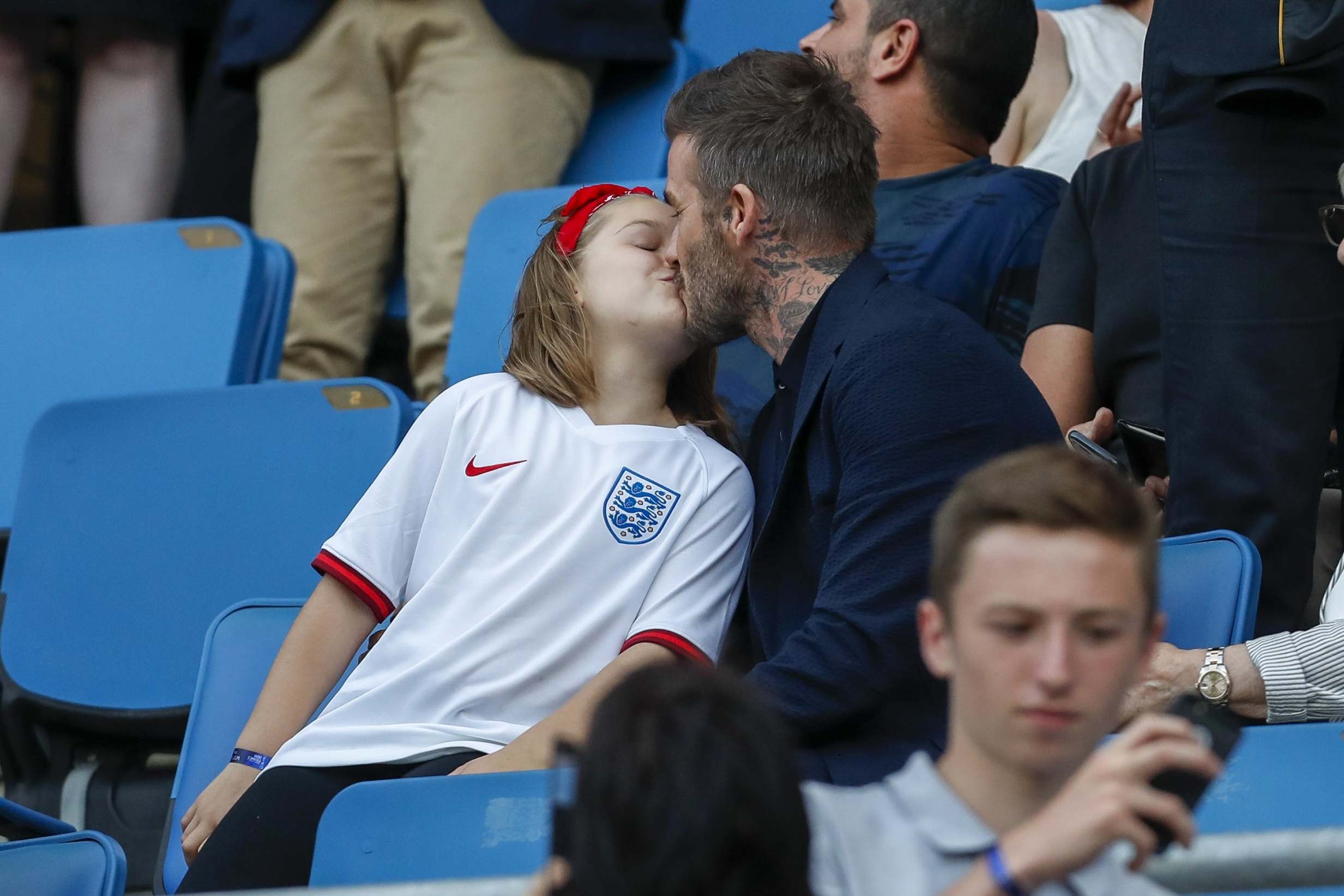 David Beckham defended by parenting experts for kissing daughter on the lips