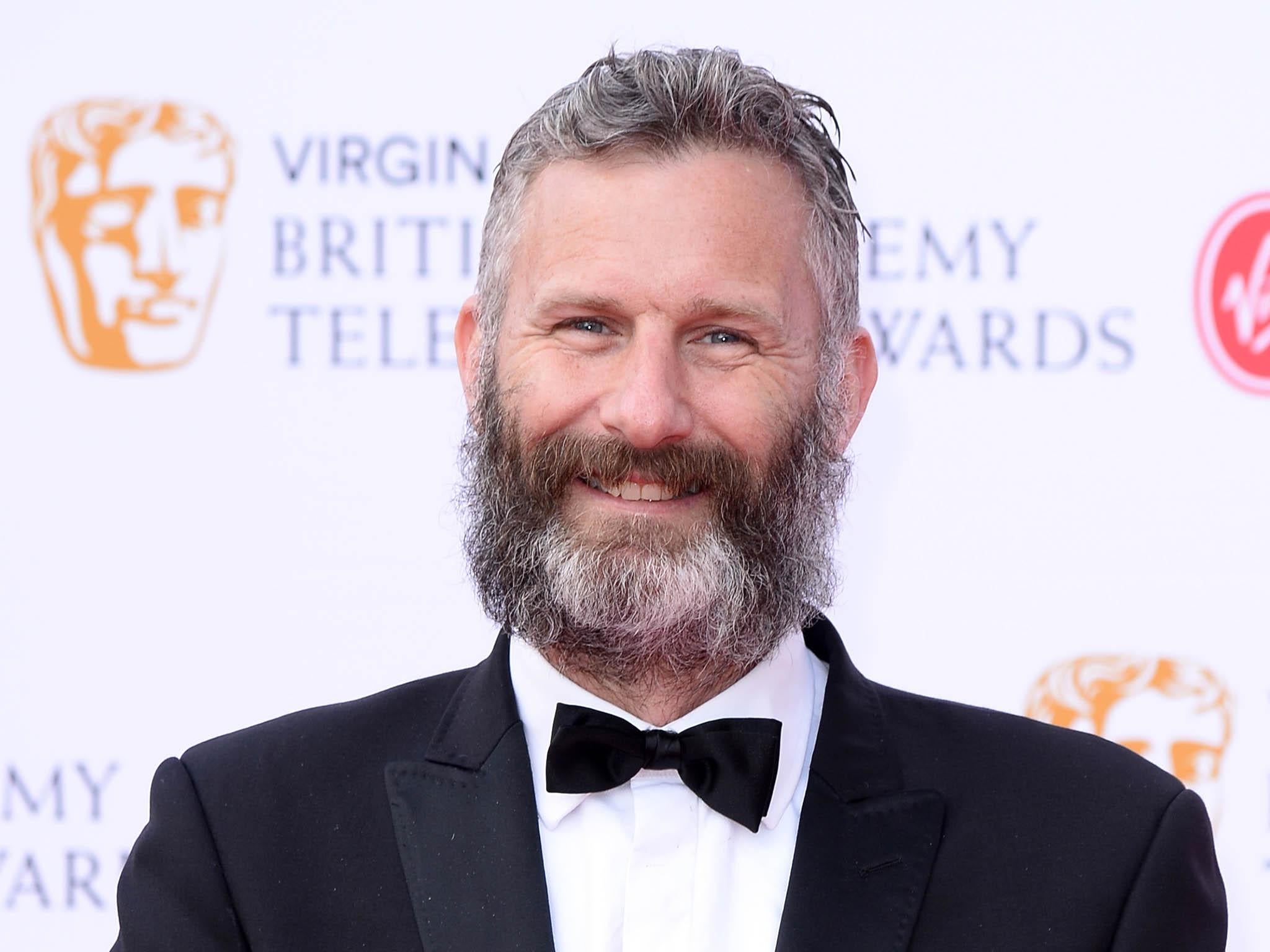 TV presenter Adam Hills is sticking with his facial growth until the deed is done