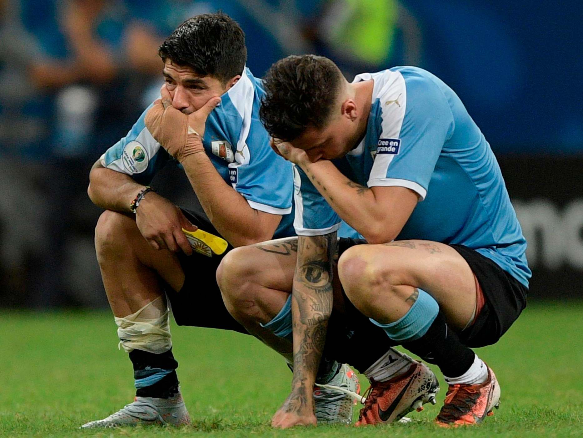 Luis Suarez reacts to missing a penalty as Uruguay were knocked out of the Copa America by Peru