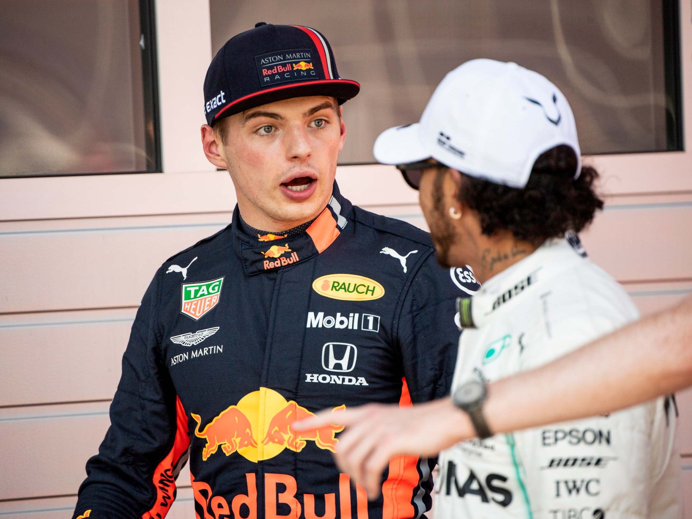 Max Verstappen speaks with Lewis Hamilton after qualifying for the Austrian Grand Prix