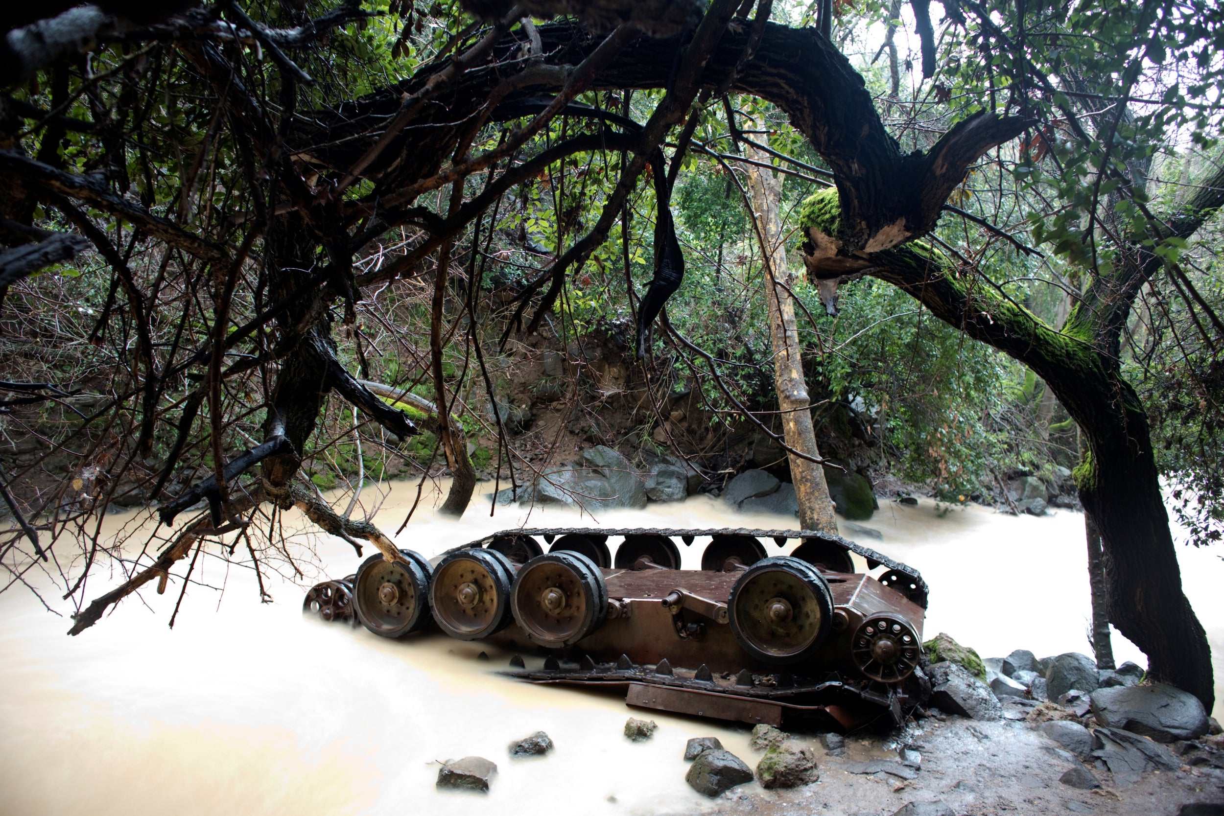A Syrian tank lies turned over in the Hermon Stream in the Banias Nature Reserve on the western edge of the Israeli-occupied Golan Heights. Israel captured the area, a former demilitarized zone, in the 1967 Six Day War
