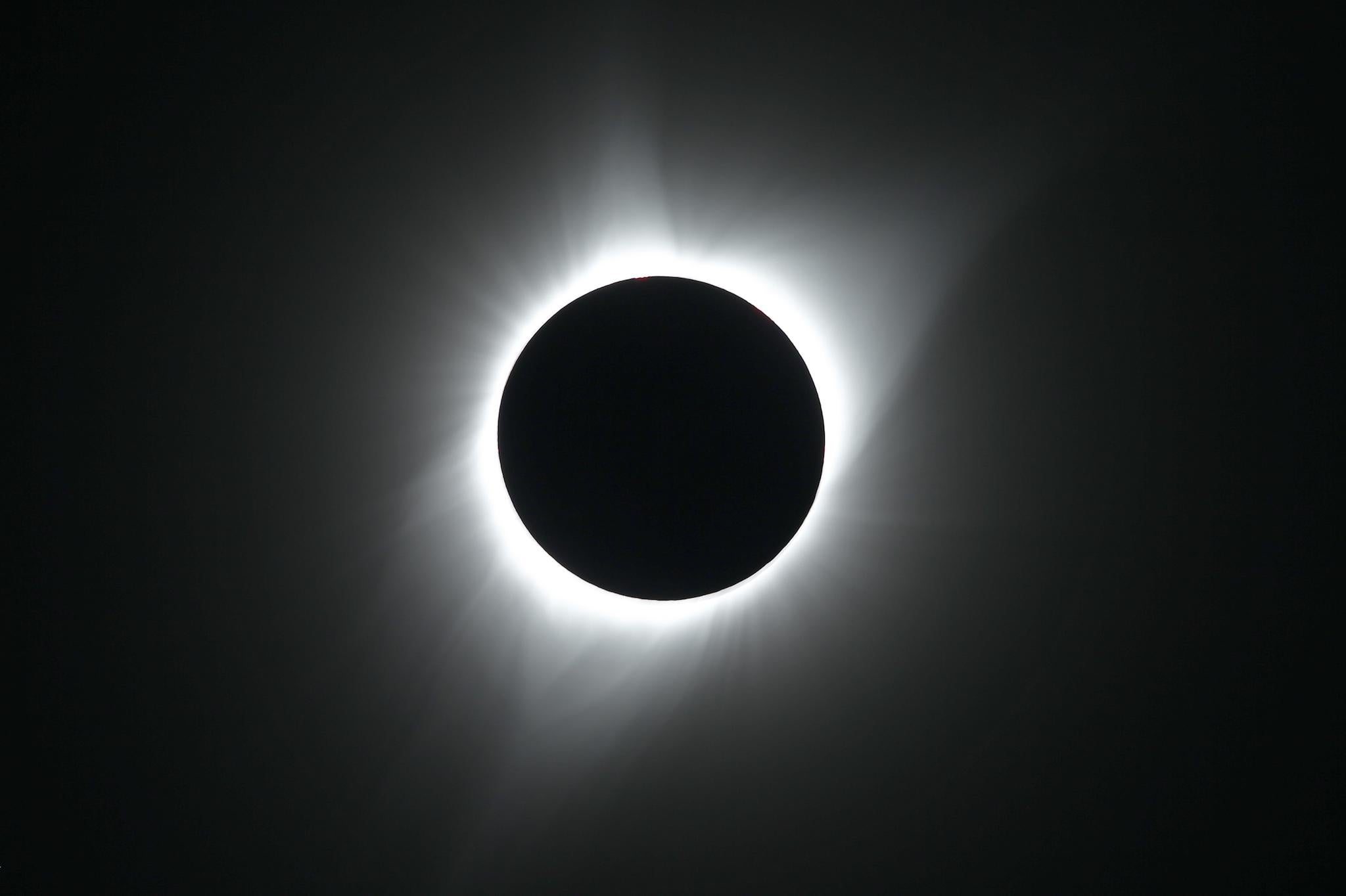 The sun is is in full eclipse over Grand Teton National Park on August 21, 2017 outside Jackson, Wyoming