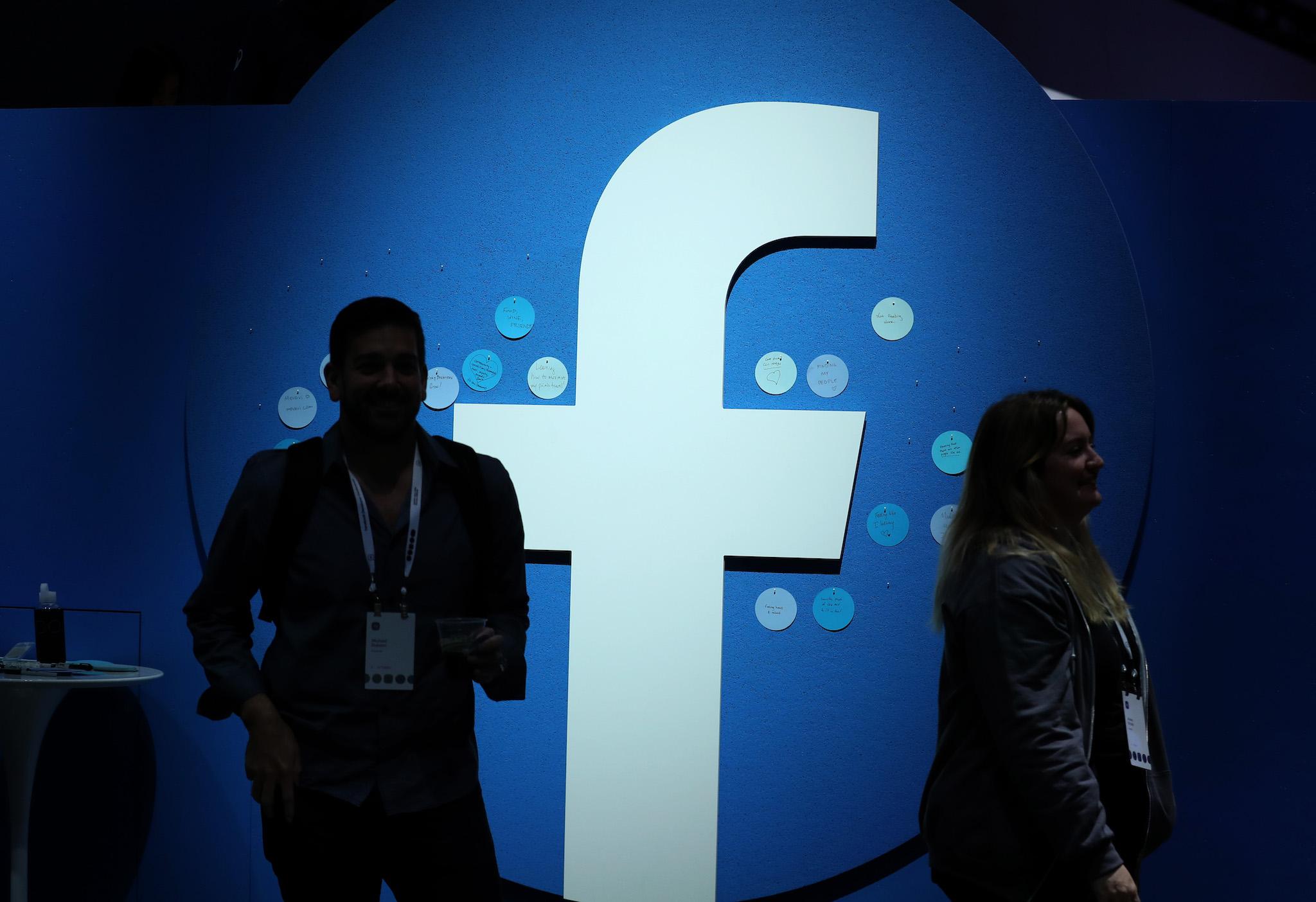 The Facebook logo is displayed during the F8 Facebook Developers conference on April 30, 2019 in San Jose, California