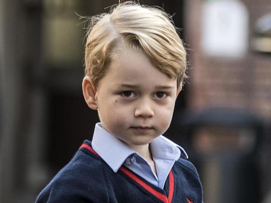 Prince George arrives for his first day of school at Thomas's school in Battersea.