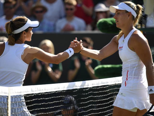 US player Lauren Davis is congratulated after beating Germany's Angelique Kerber