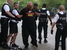 Police fist bump Trump supporter from far-right Proud Boys group after 4th of July clashes