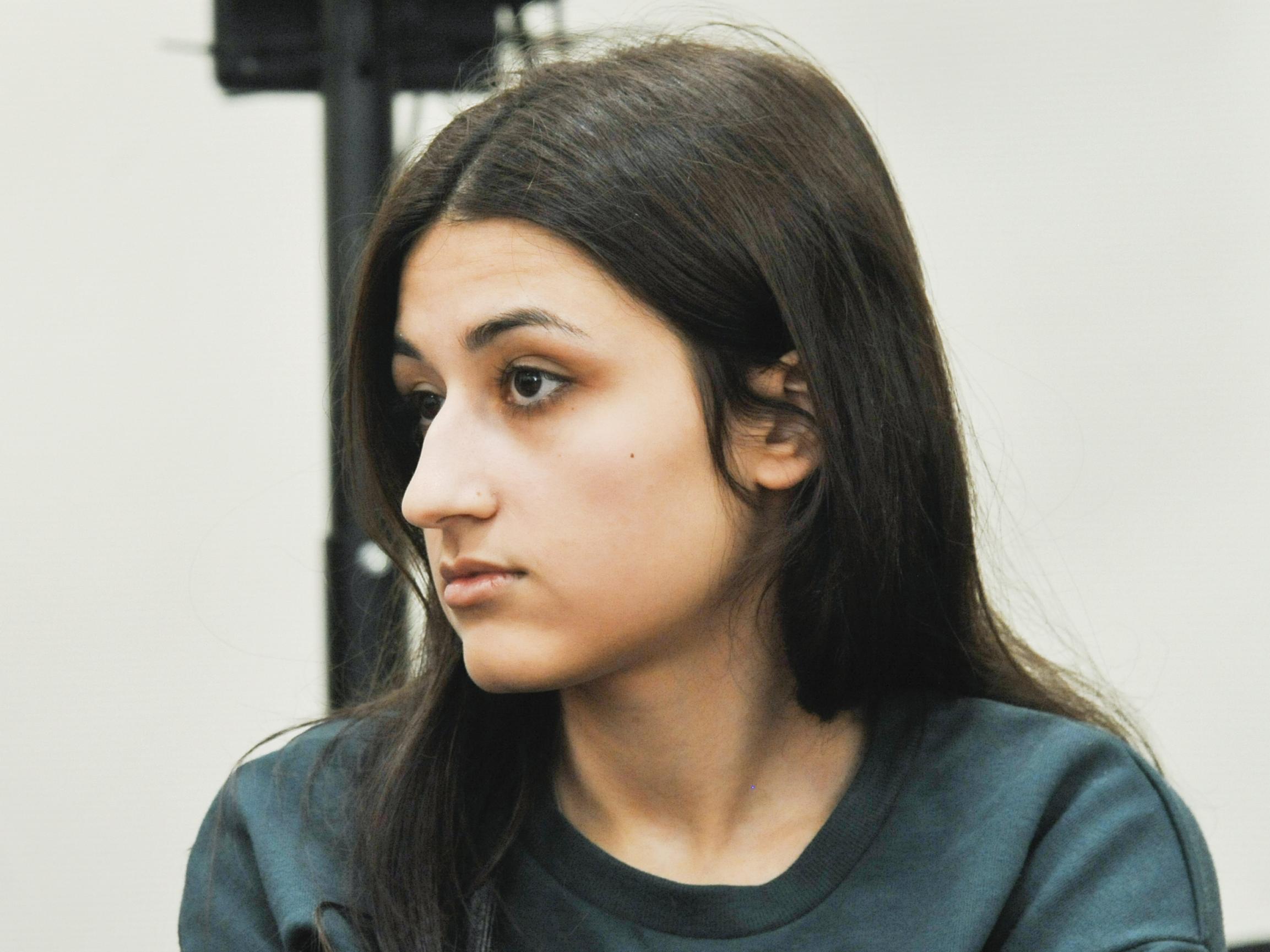 Maria Khachaturyan attends hearings in a court room in Moscow, Russia, where she's been charged with the murder of her father