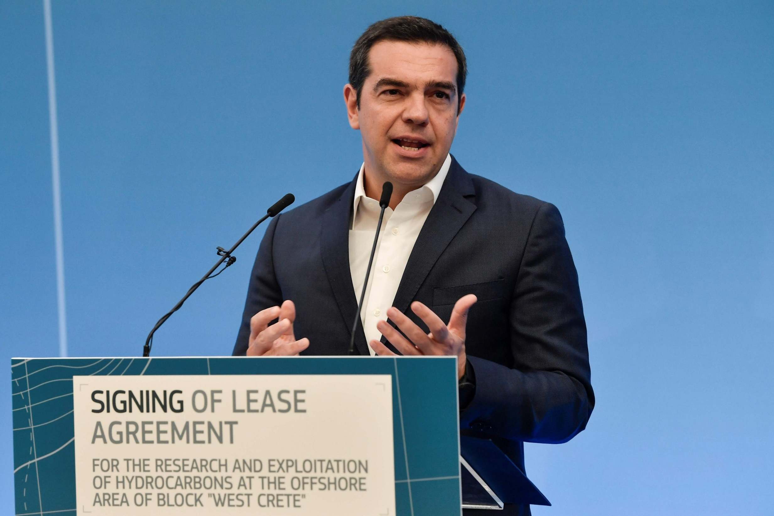 Greek Prime Minister Alexis Tsipras gestures as he delivers a speech