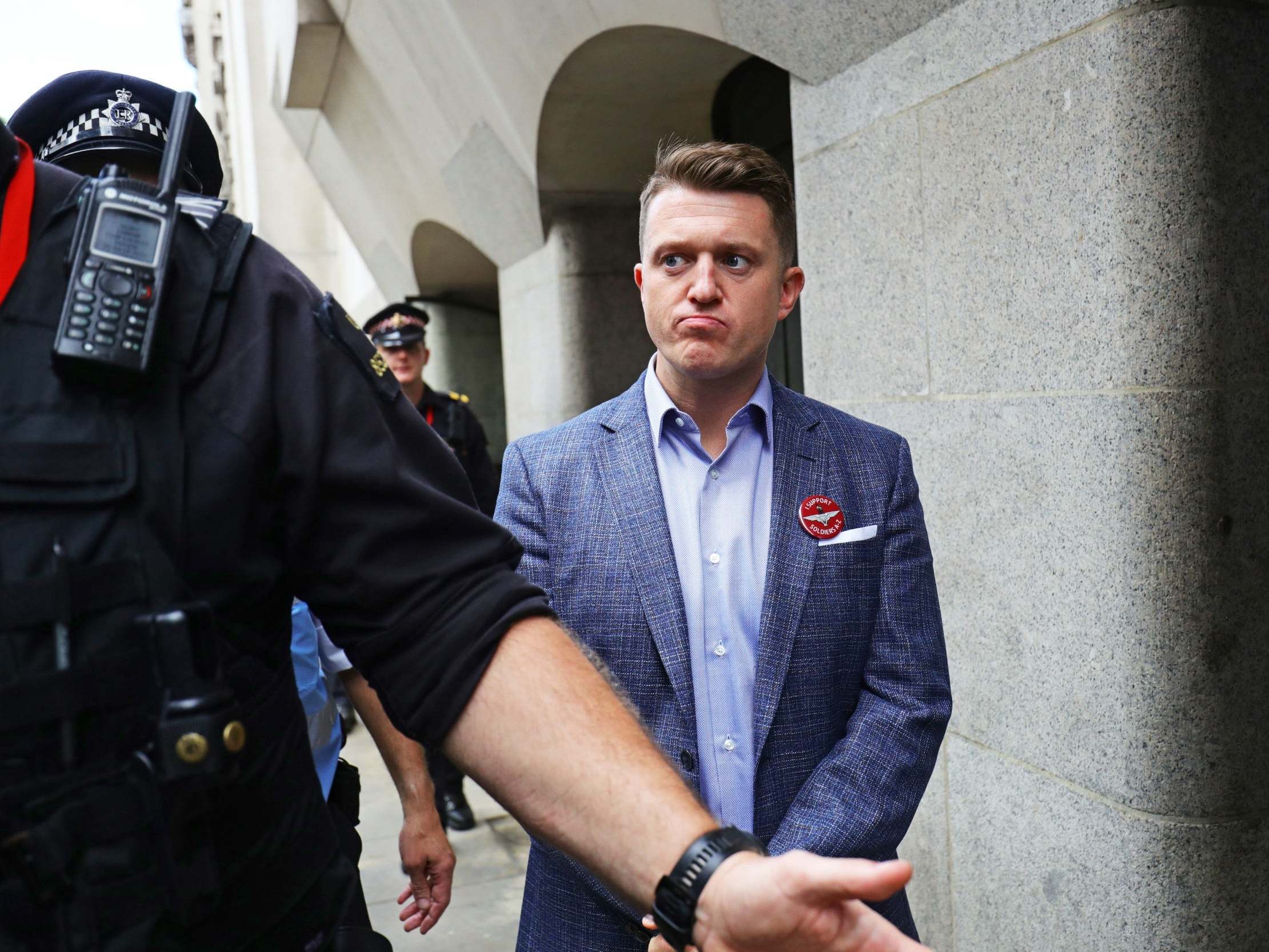 Tommy Robinson outside the Old Bailey in London after being found in contempt of court by High Court judges