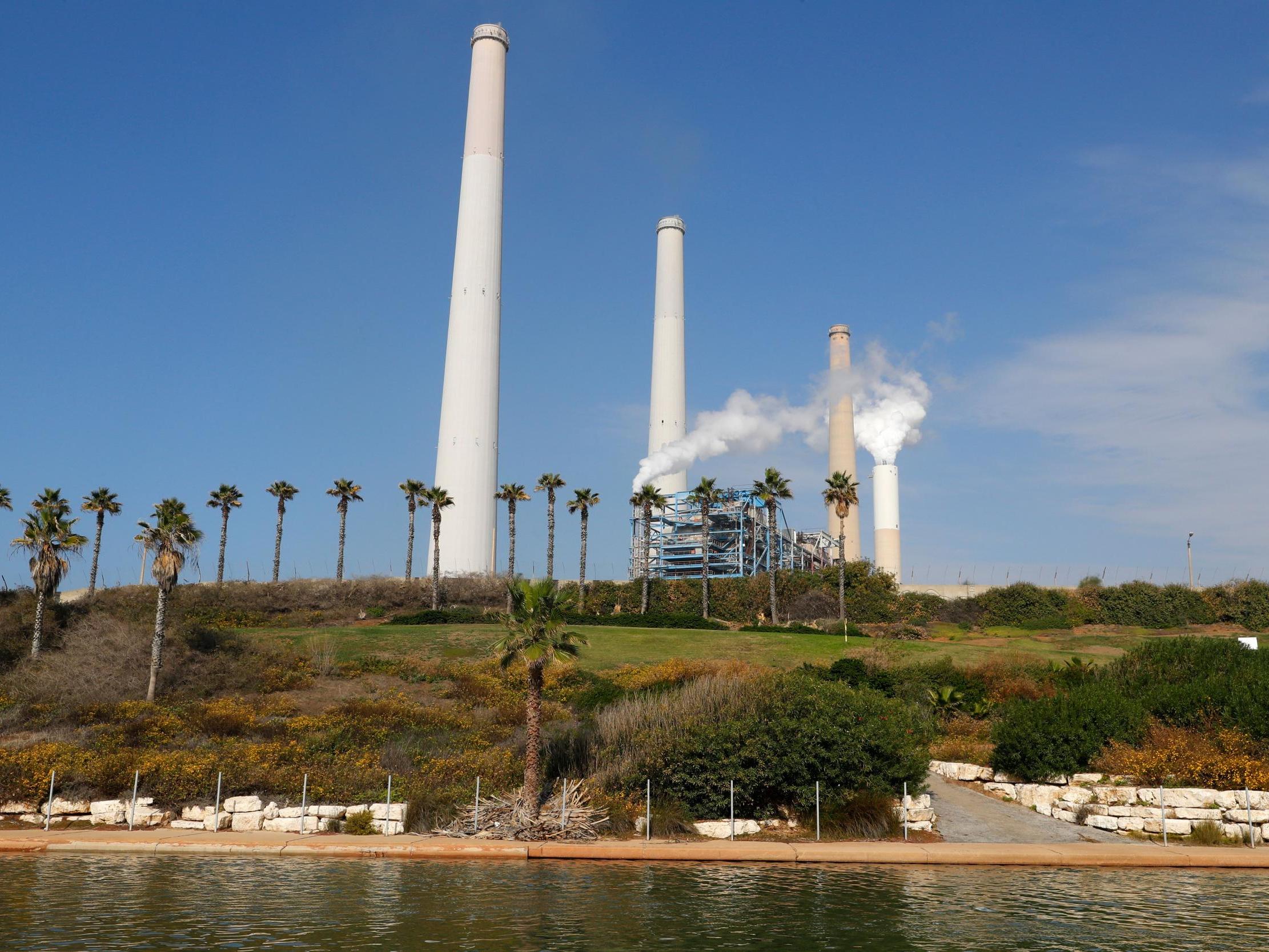 Israel's energy dilemma is captured in the northern coastal city of Hadera, where the country's largest coal-fired power station is set to be converted to gas