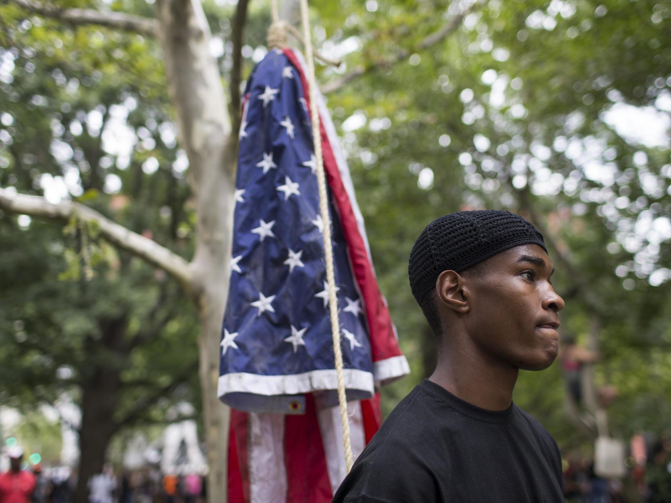 The American culture war regularly spills out onto the streets with counter protestors (one pictured here opposing a neo-Nazi rally last summer) clashing rising up against white nationalists