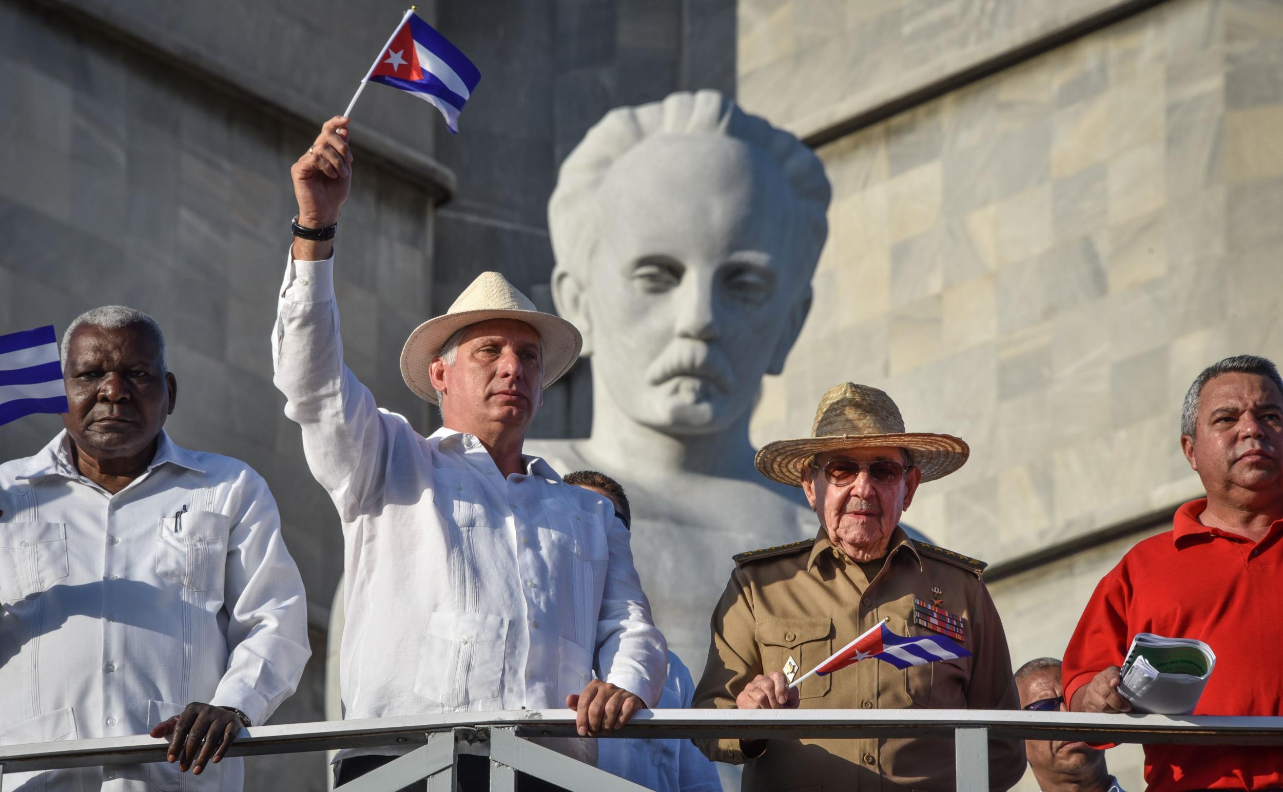 President Miguel Diaz-Canel (second L) has embraced social media since succeeding the Cuba's more traditional former leader Fidel Castro