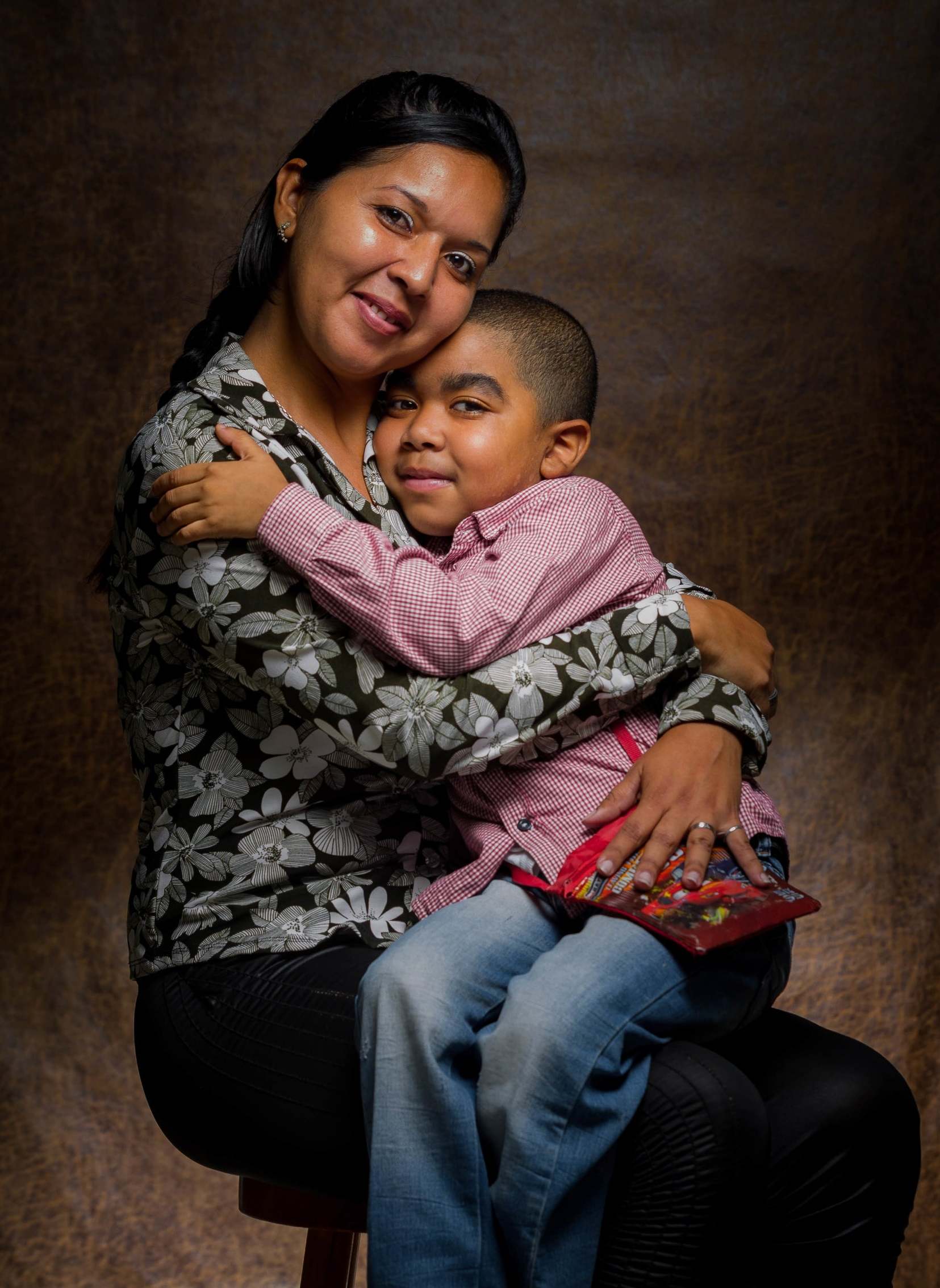 Yelitza Parra poses with her 7-year-old son Alyeiner Moises in Caracas, Venezuela. Alyeiner has been diagnosed with severe bone marrow aplasia and needs constant treatment and transplants, especially of platelets. Derived from his low defenses, he also suffers from Hepatitis C and Cushing's syndrome