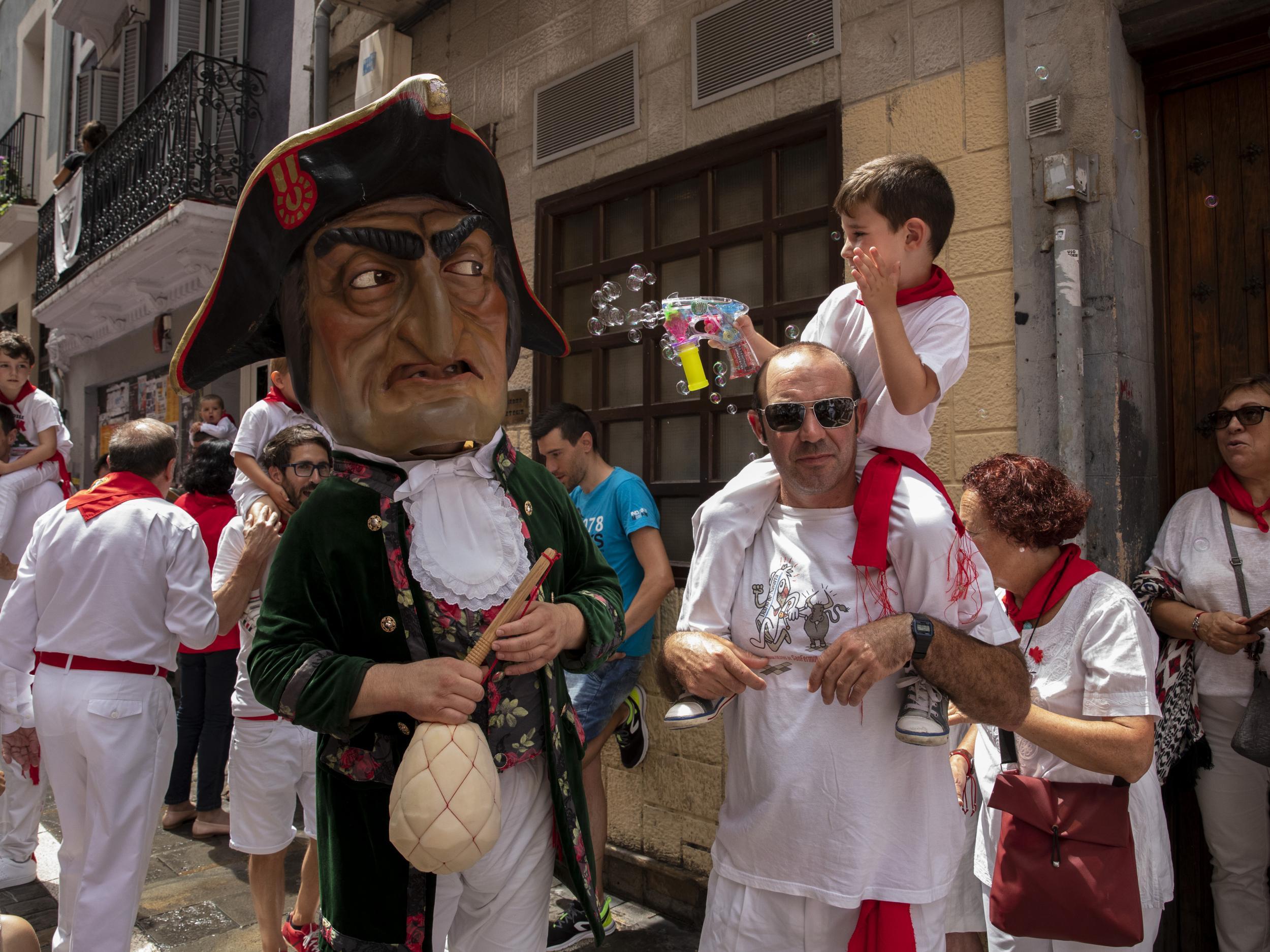 On parade: grotesque puppets march through the town (Getty)