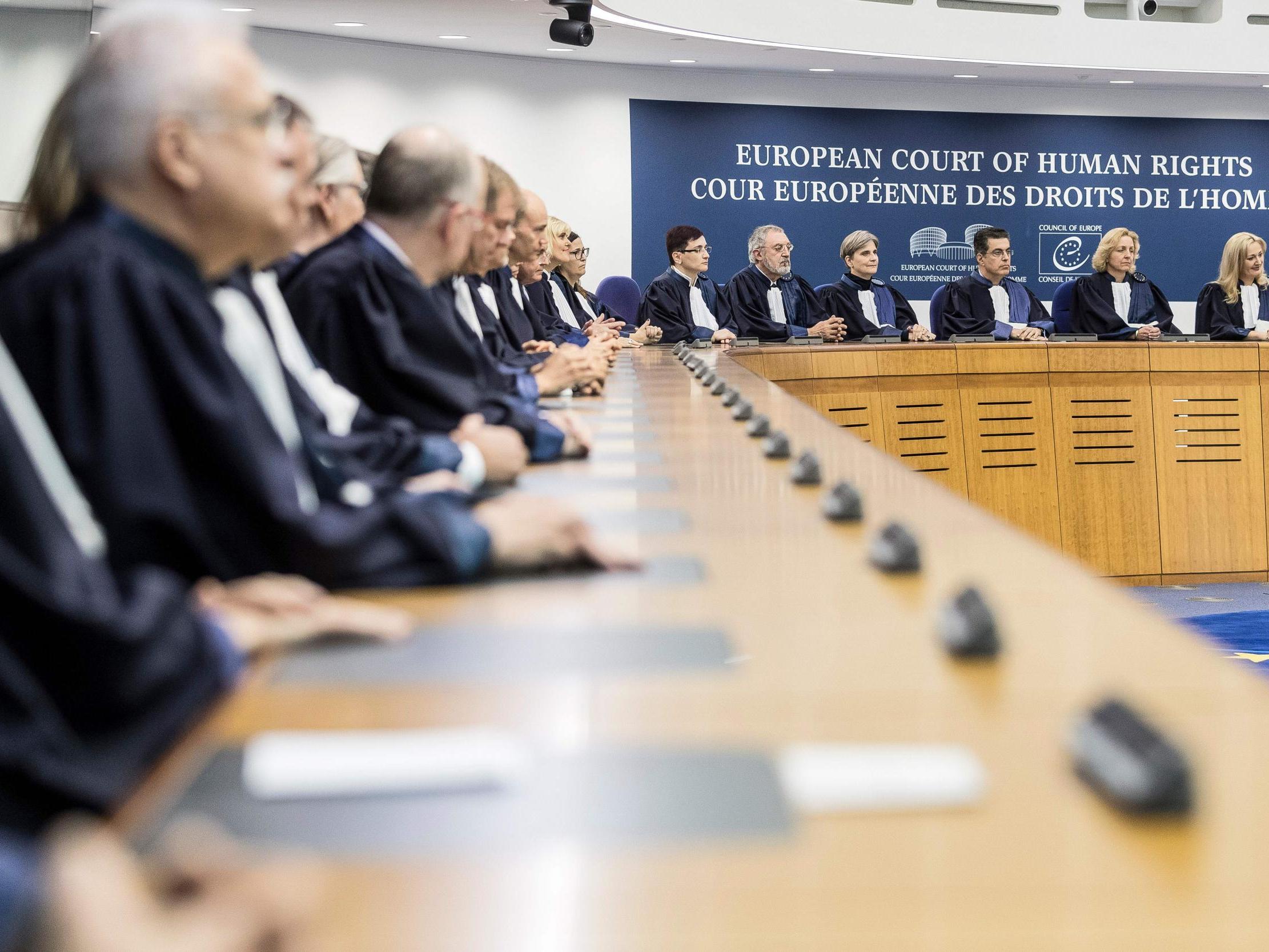 Judges of the European Court of Human Rights listen in Strasbourg