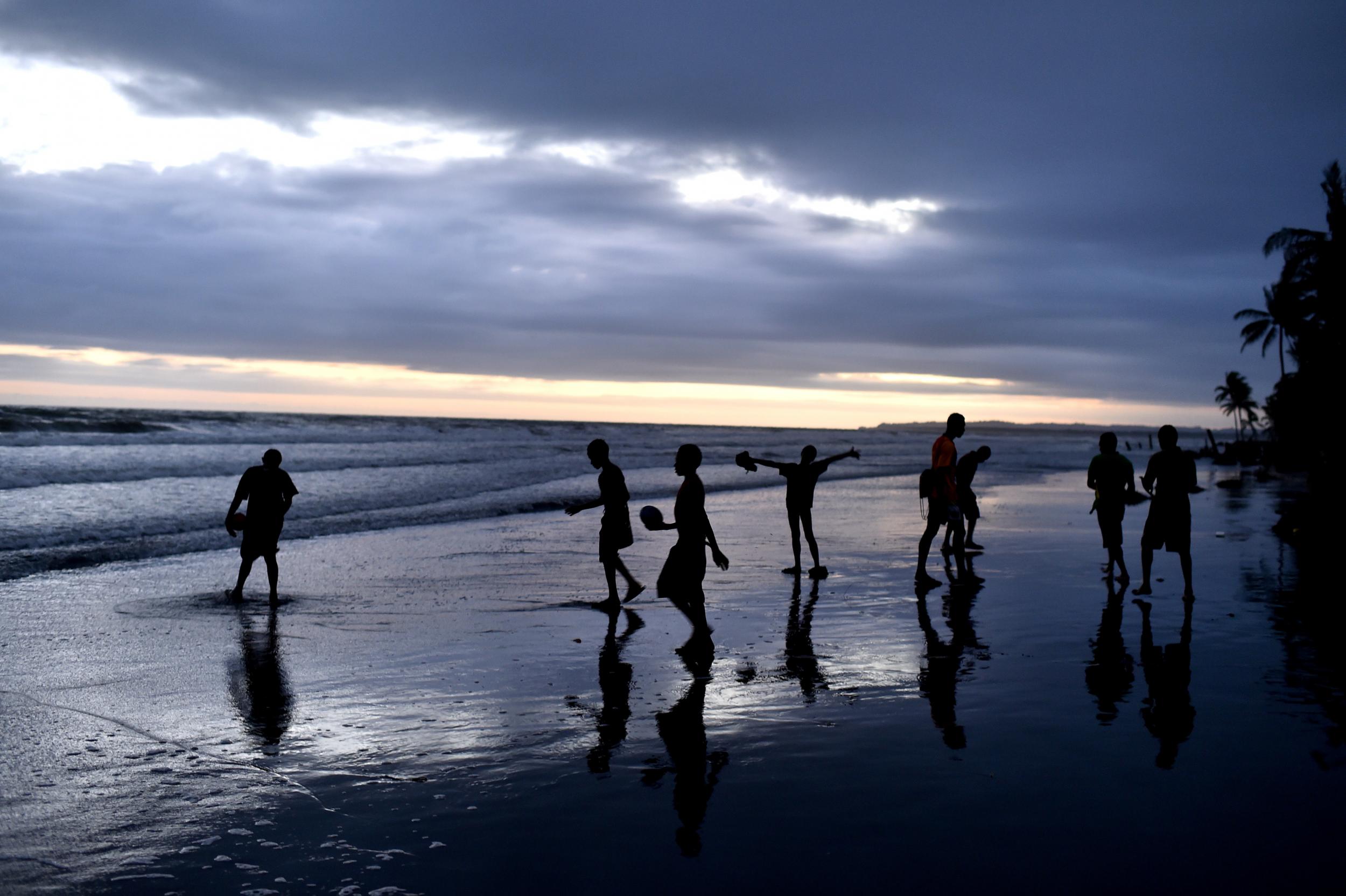 The island has beautiful views, at day and night (AFP)