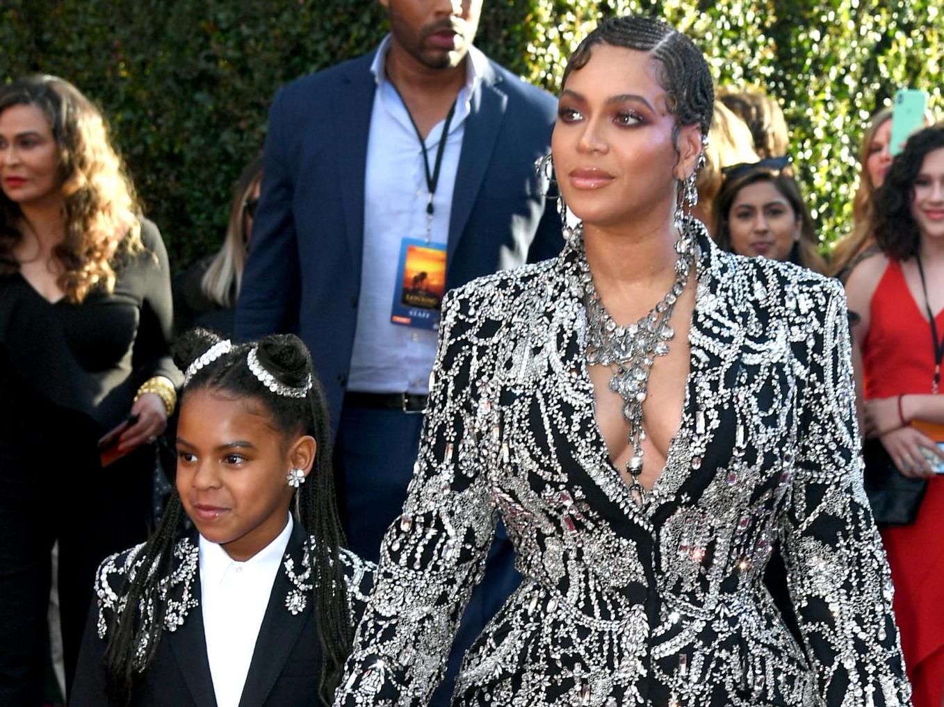 Blue Ivy Carter and Beyoncé attends the premiere of Disney's "The Lion King" at Dolby Theatre on July 09, 2019 in Hollywood, California.