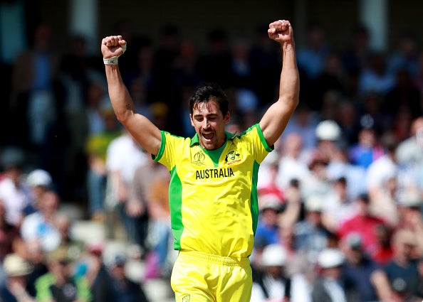 Mitchell Starc celebrates taking the wicket of West Indies’ Chris Gayle