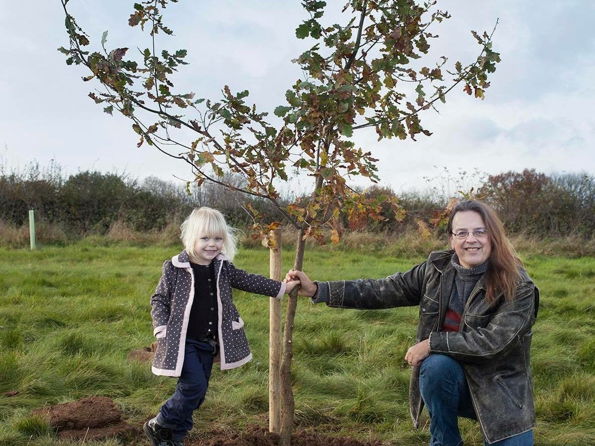 Tim Pollard with daughter Scarlett at Dale Hill green burial ground in Derbyshire