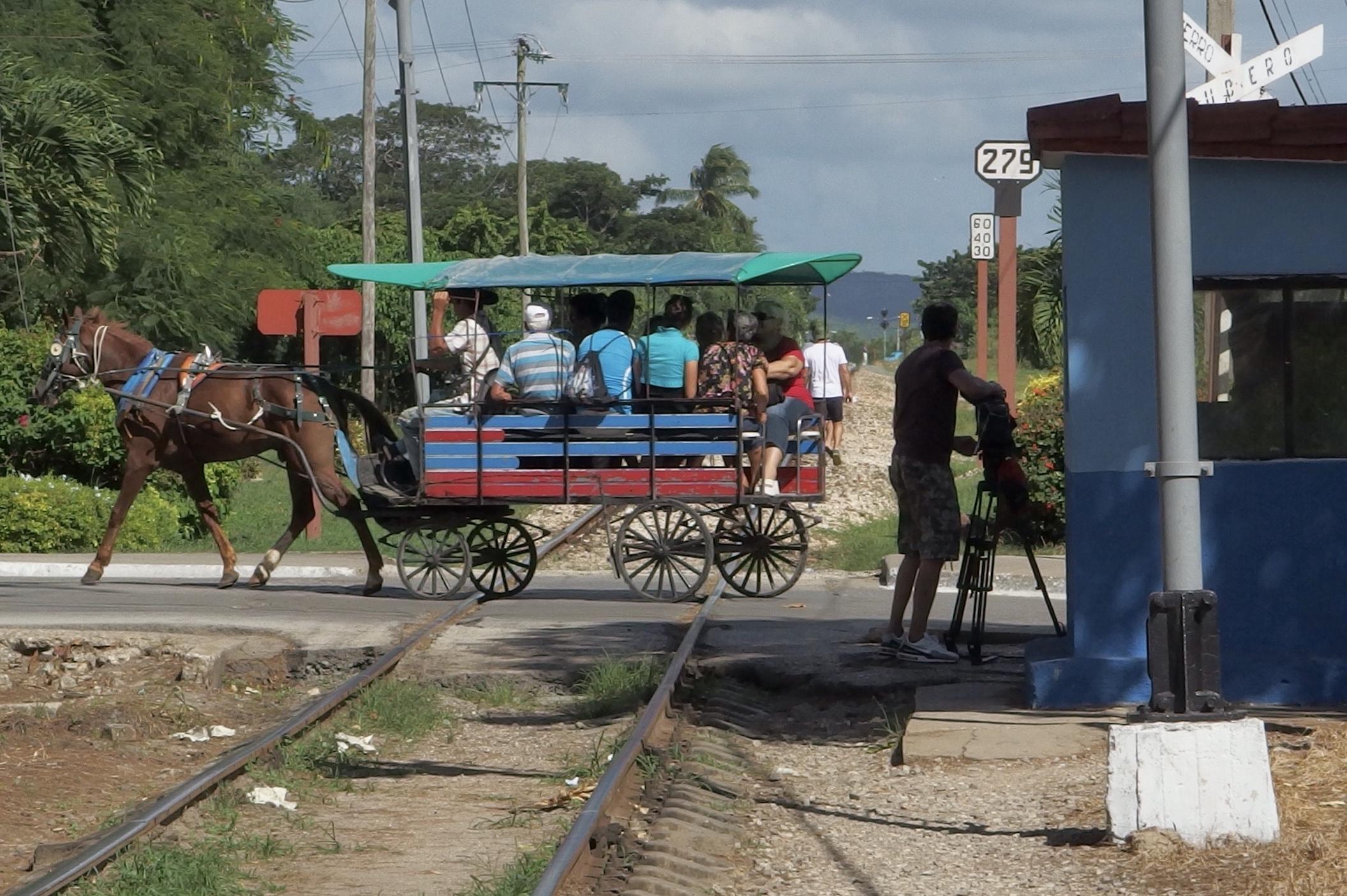 The horse-drawn buses crossing the track in the central city of Santa Clara look plausibly faster than the trains that ply the length of the island