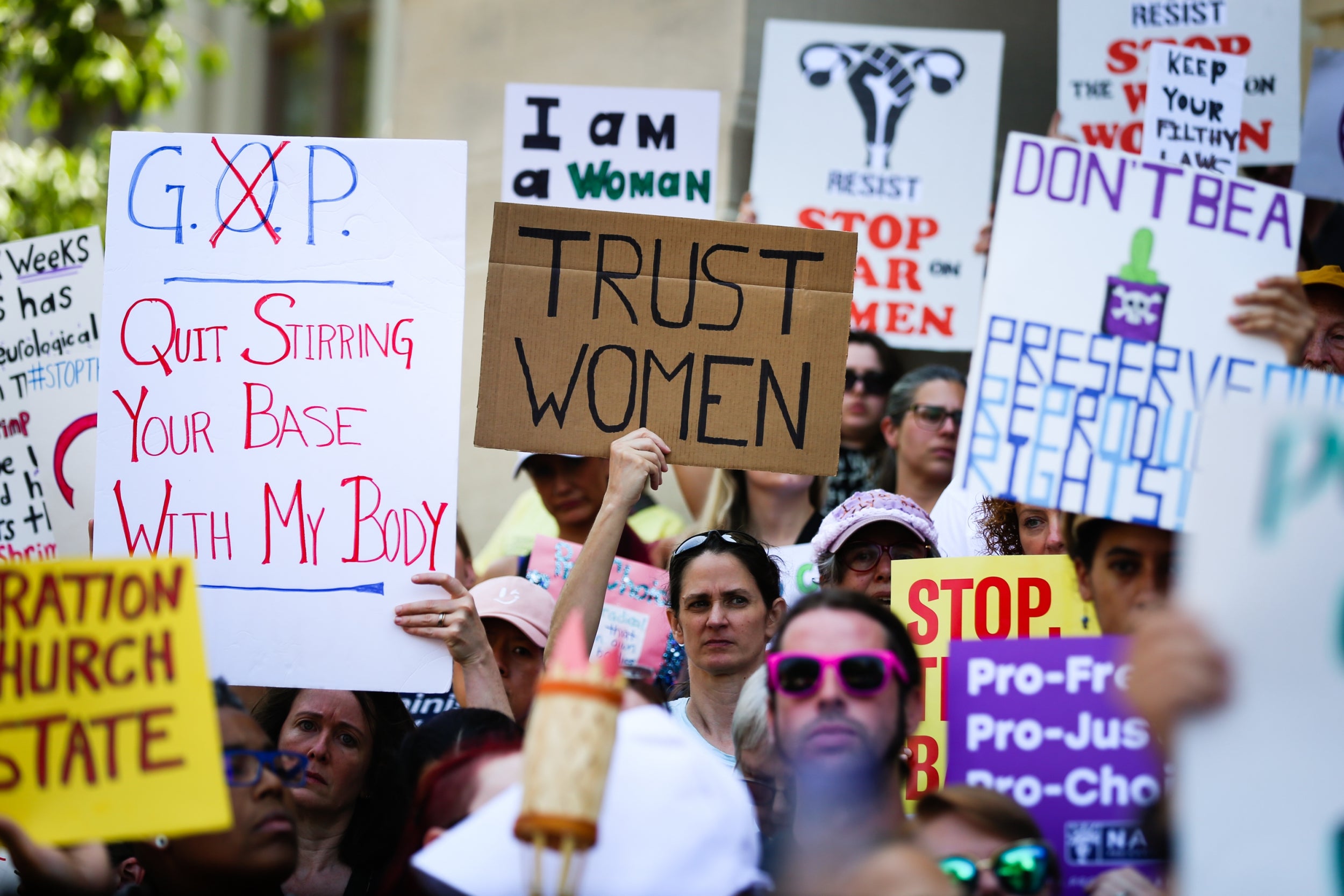 Protesters in Georgia rally against the state's restrictive abortion legislation. Several federal court judges have ruled against similar measures in other states.