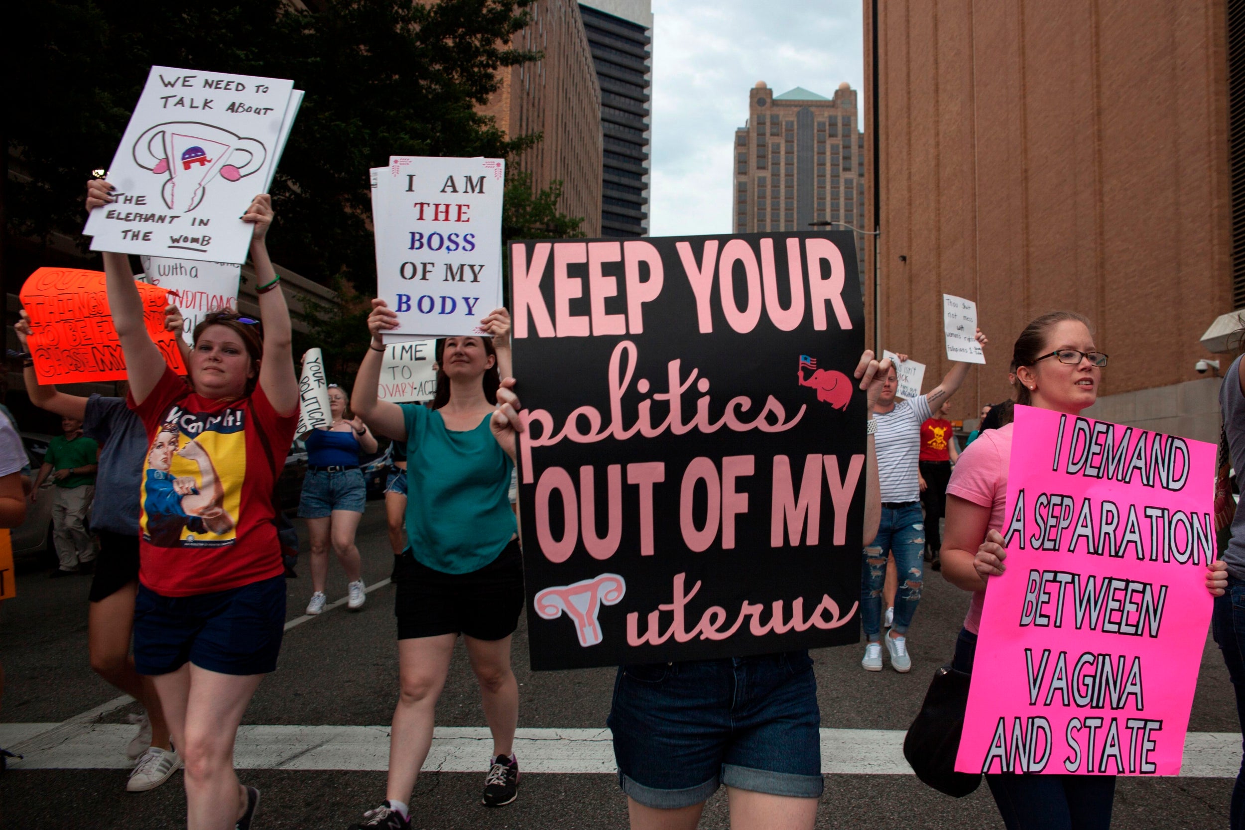 Pro-choice protesters march through the streets of Birmingham, Alabama