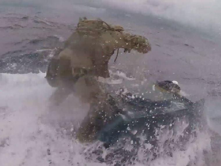 US Coast Guard filmed raiding moving submarine filled with £185m of cocaine