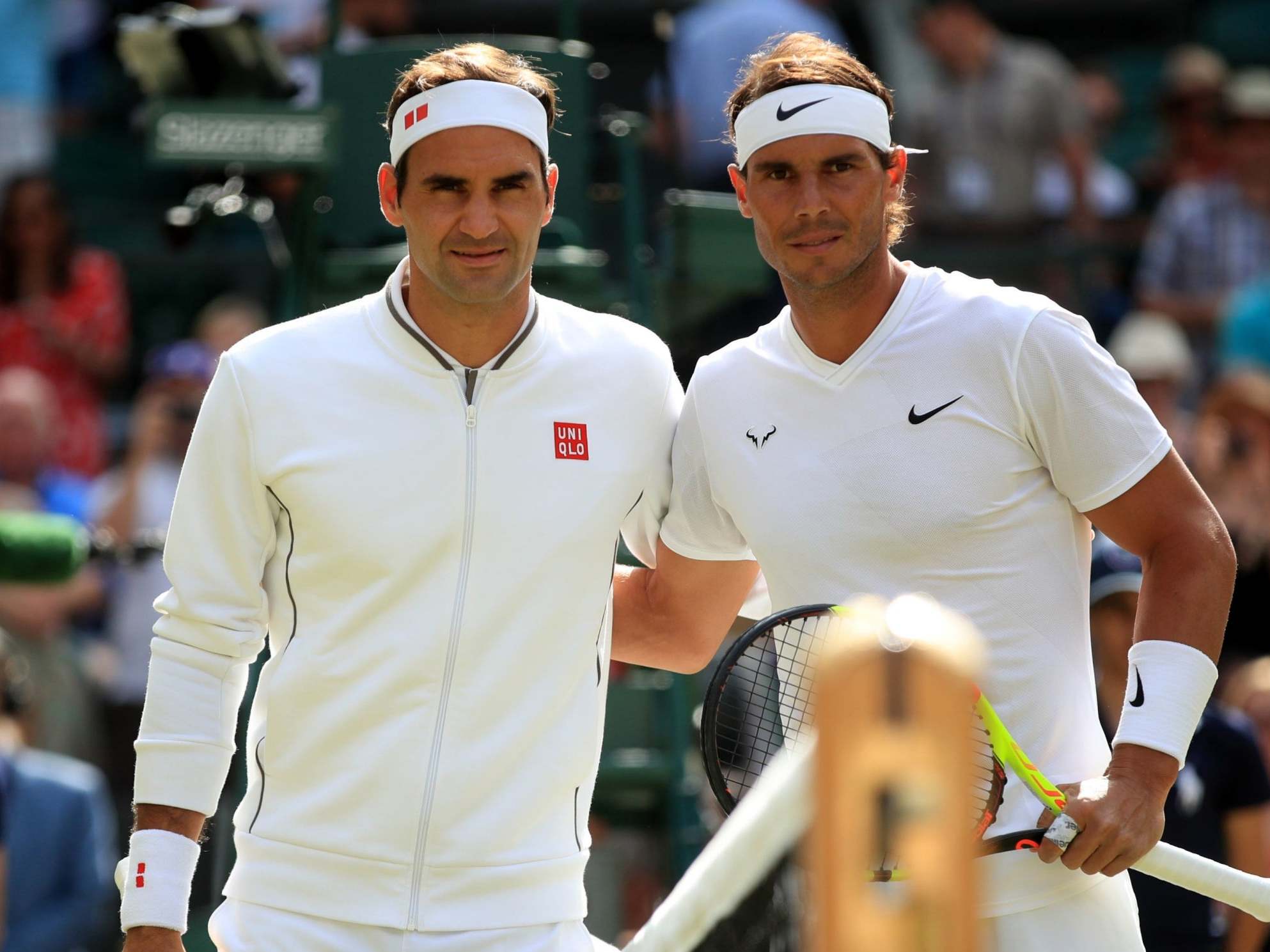 Roger Federer and Rafael Nadal pose before their match