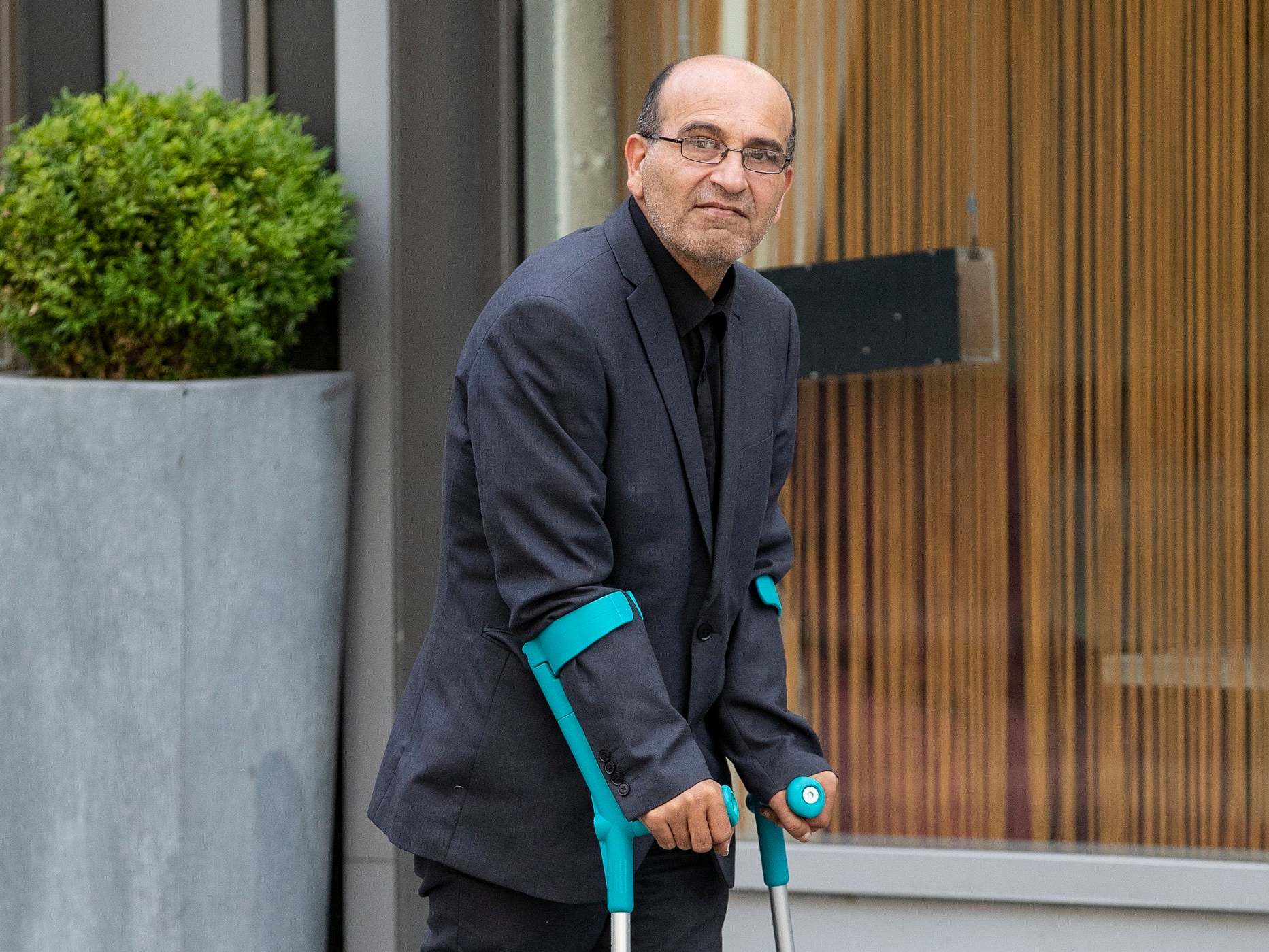 Ghaleb Makki, the father of the 17-year-old victim, arrives at Manchester Crown Court