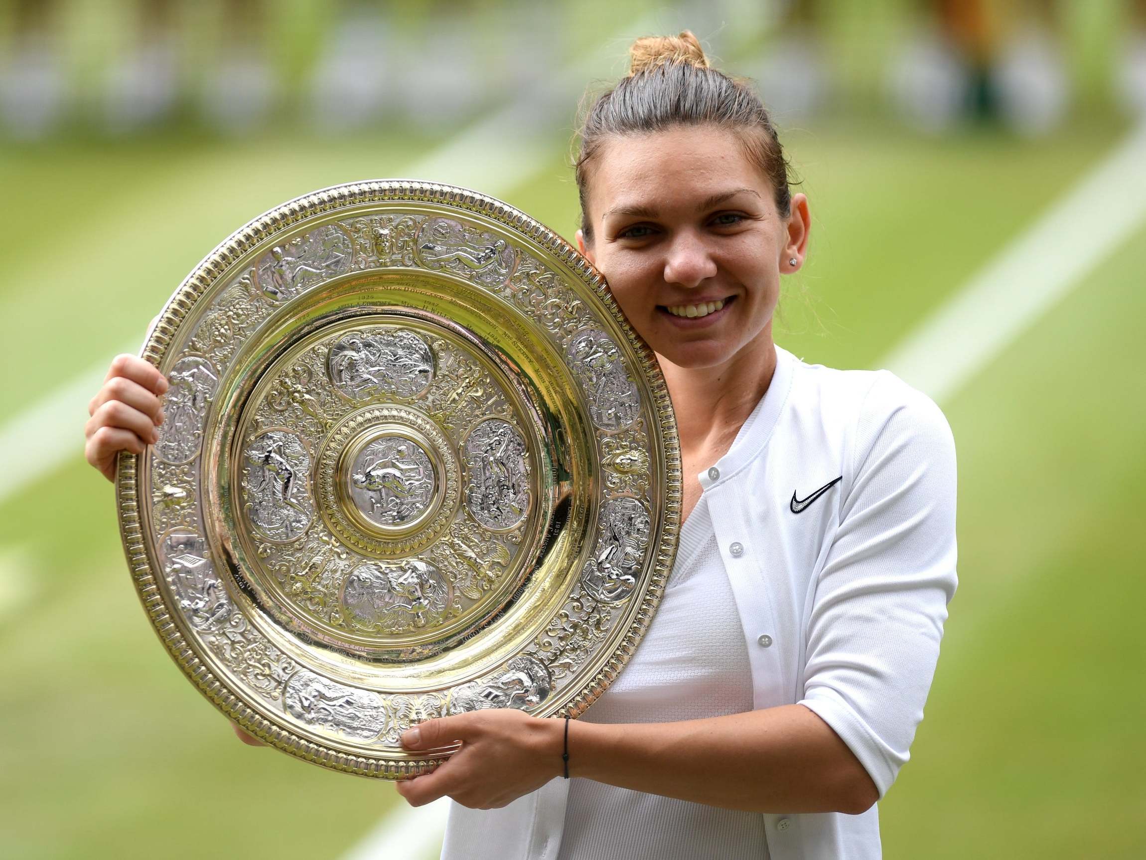 Simona Halep celebrates her triumph