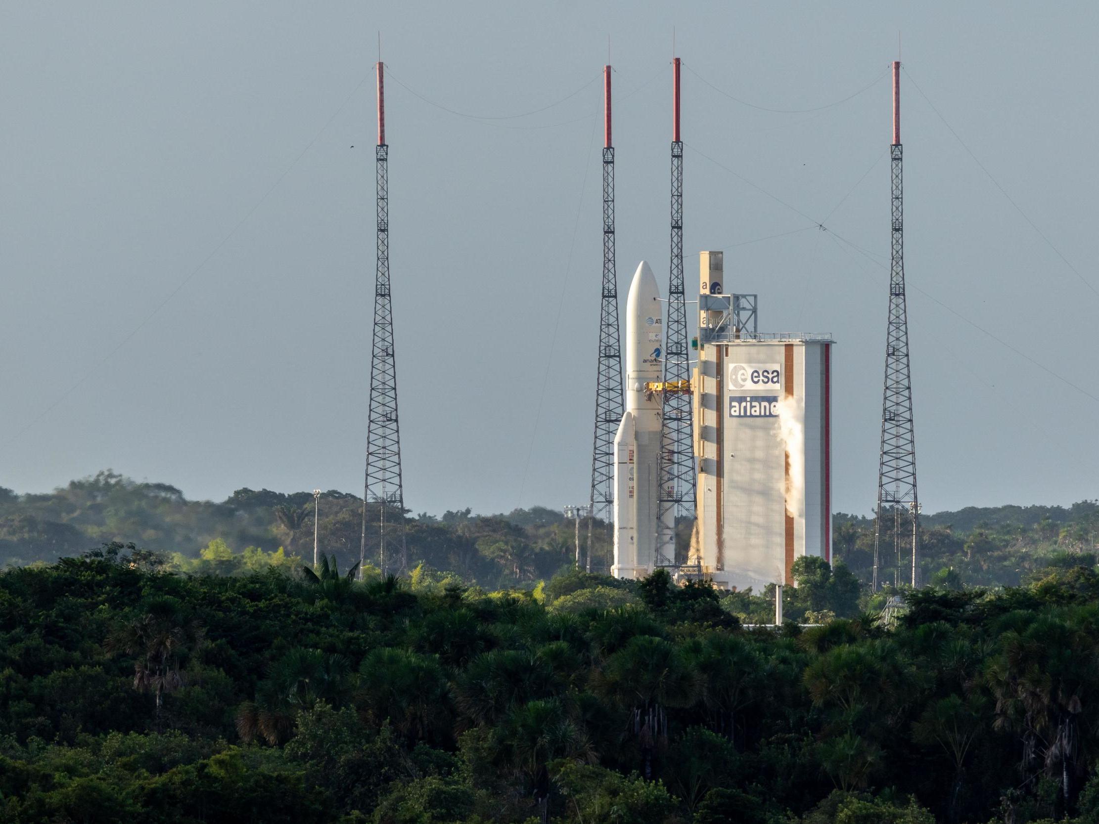 A rocket lifts off carrying satellites from the European Space Center in French Guiana