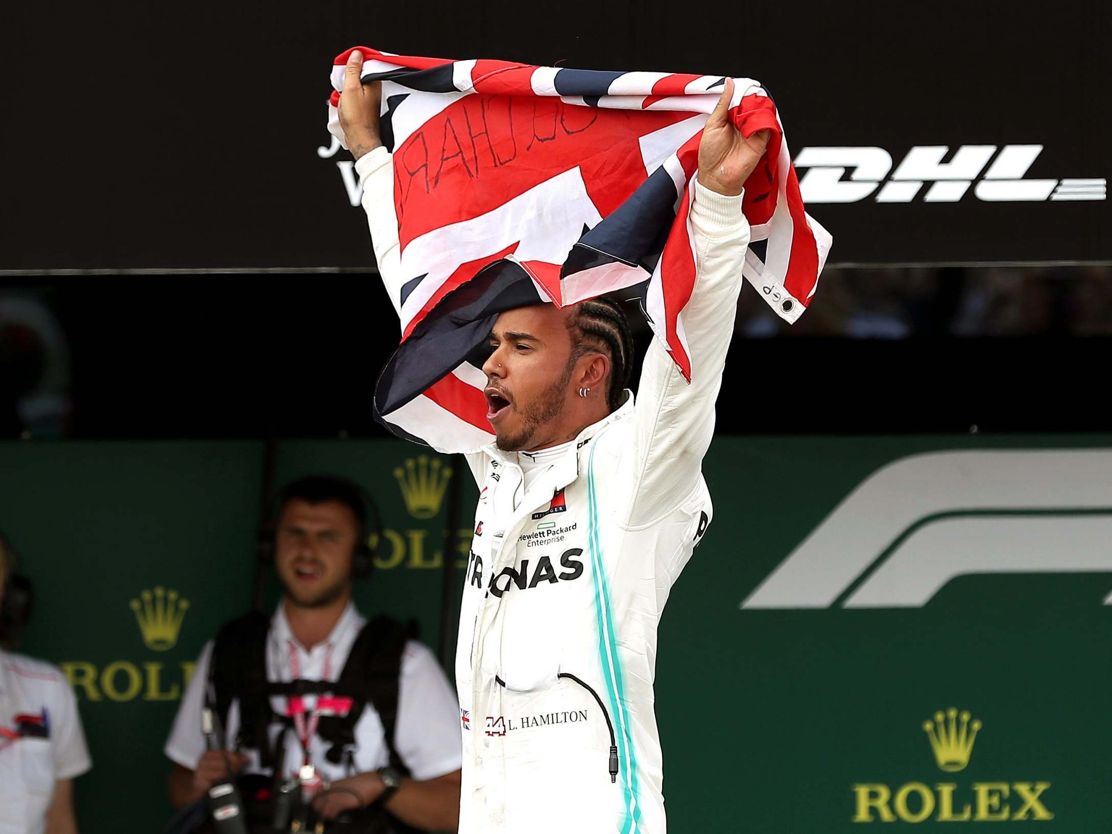 Lewis Hamilton celebrates winning the British Grand Prix