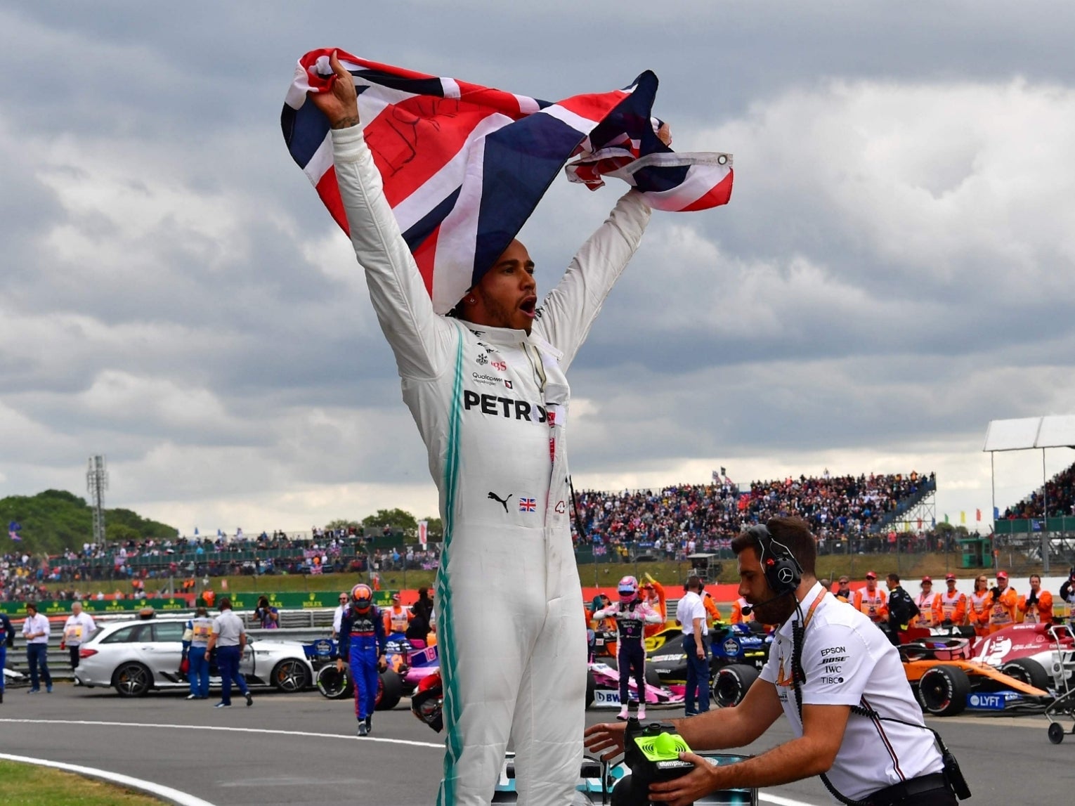 Lewis Hamilton celebrates winning at Silverstone