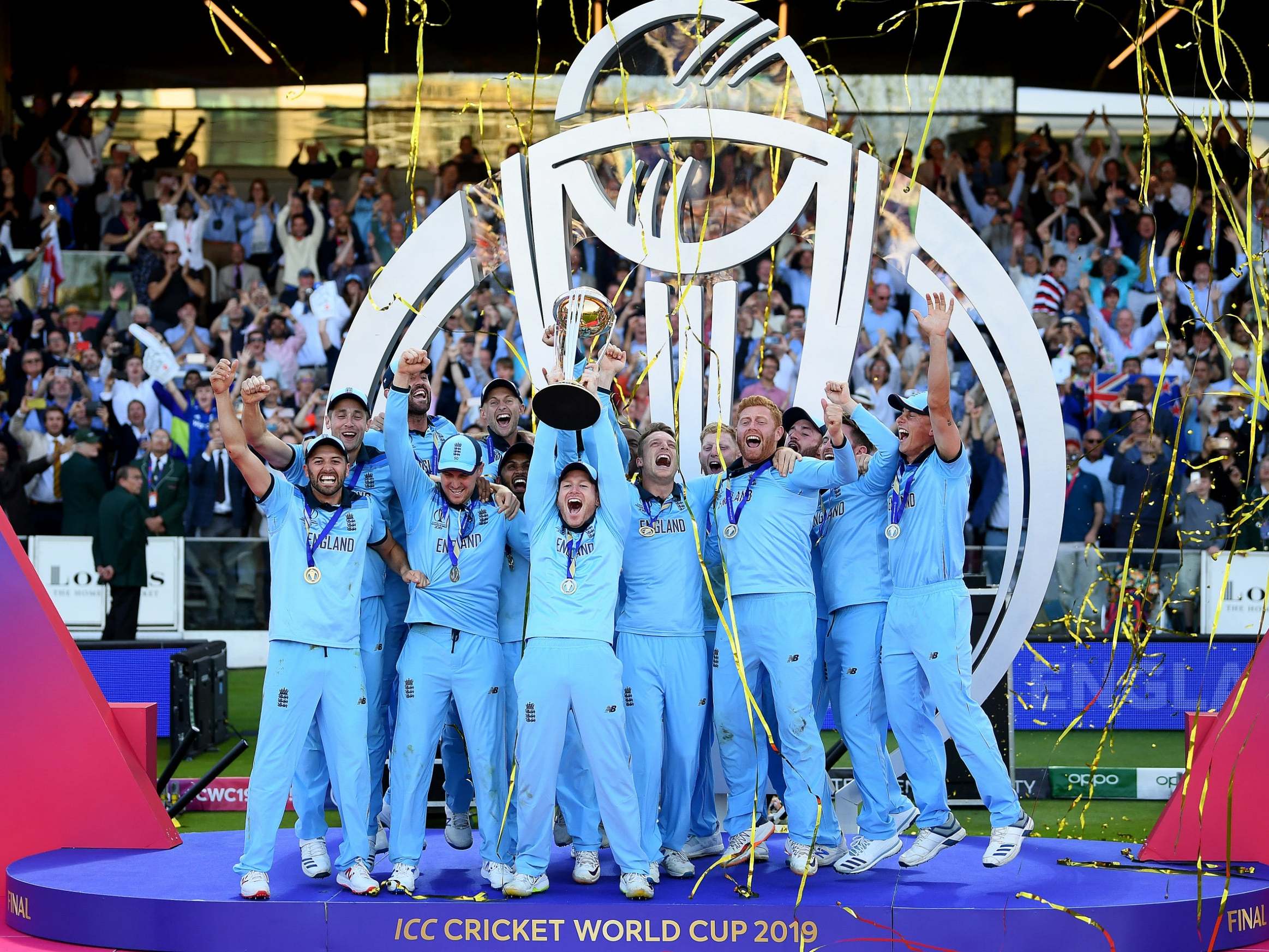 Morgan lifts the trophy after England win the World Cup