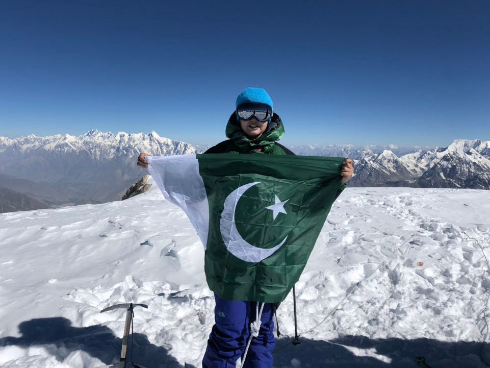 Komal Uzair at the summit of Spantik Peak; she is the second Pakistani woman to have made the climb