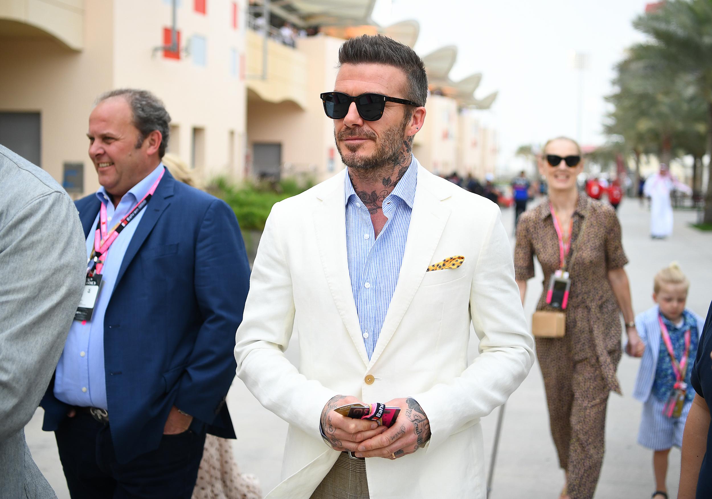 David Beckham continues to be the suave fashion icon we all know thanks to his impressive collection of polished suits that almost always offer a glimpse at his famous tattoos.