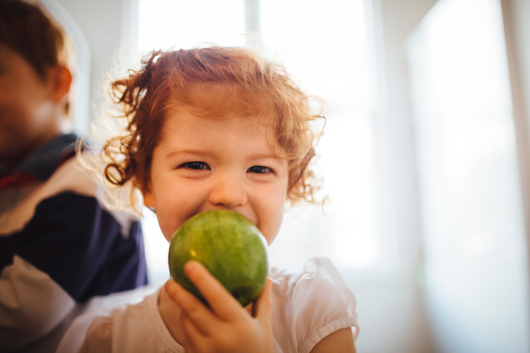 Child eating an apple