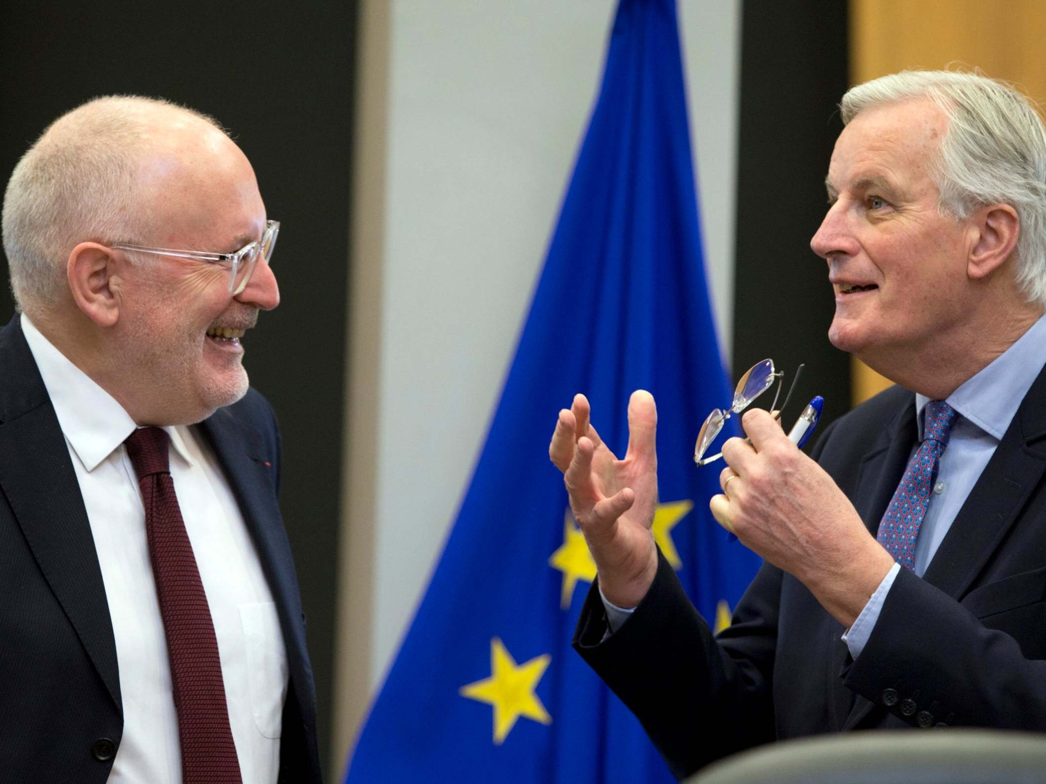 Businesslike welcomes: European Commission vice president Frans Timmermans (left) with EU chief Brexit negotiator Michel Barnier