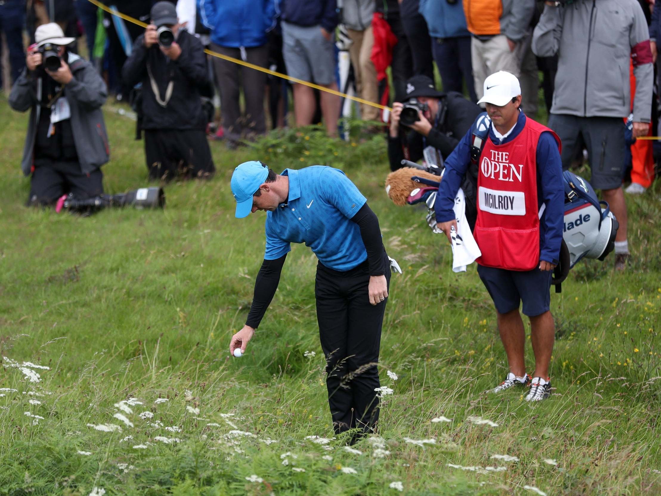 McIlroy takes a drop on the first hole at The Open on his way to a quadruple bogey