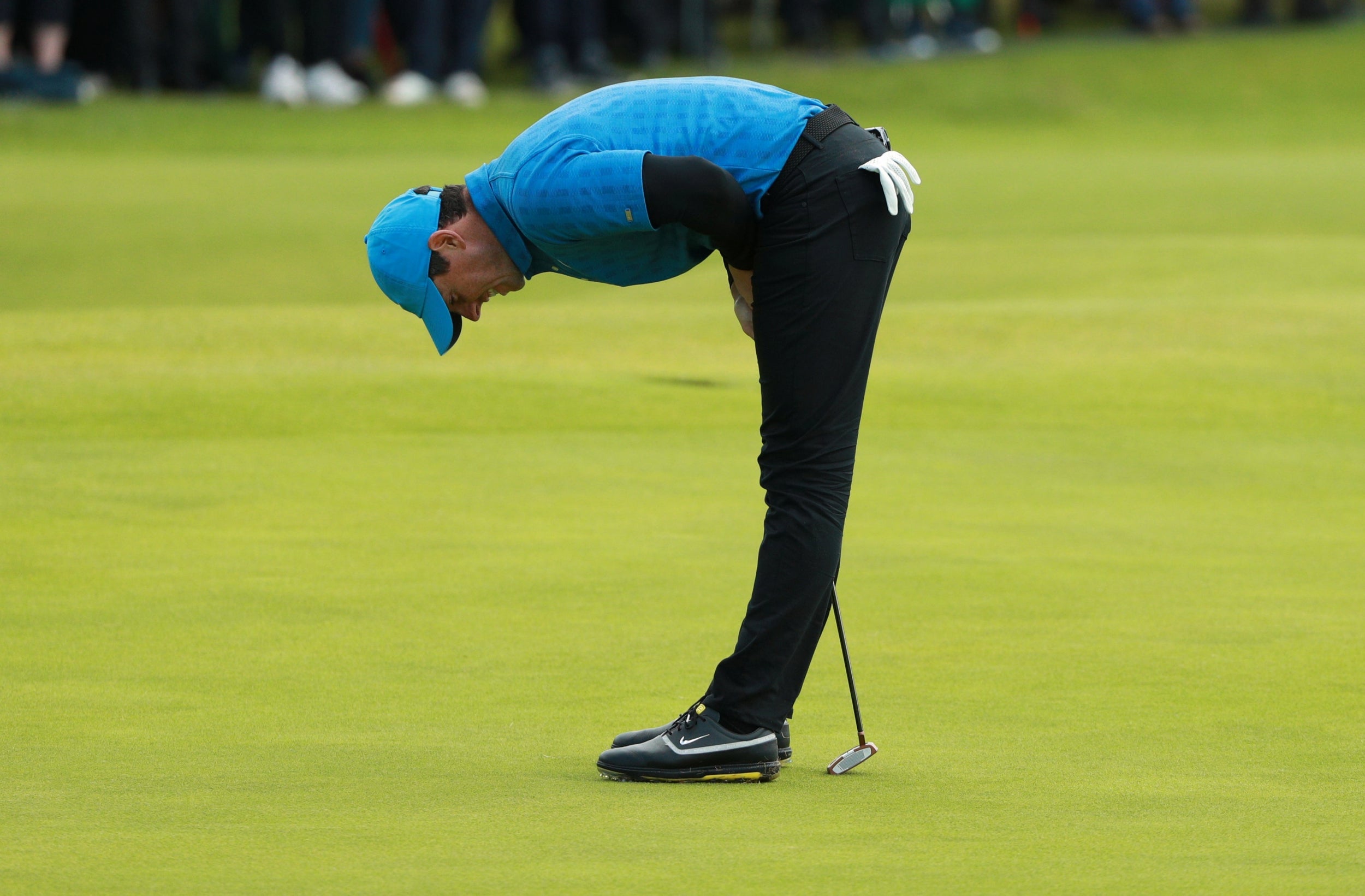 Rory McIlroy reacts to a missed putt (Reuters)