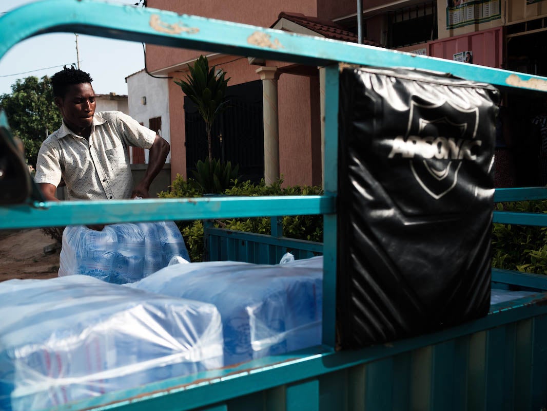 Ayao at his part-time job delivering drinking water