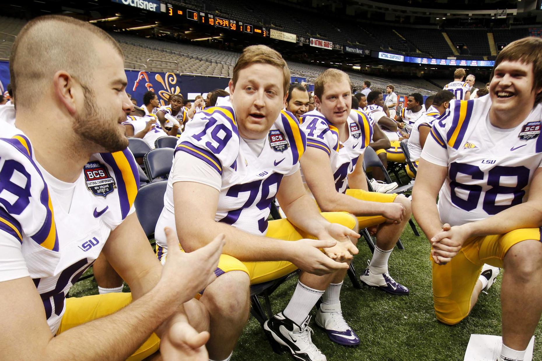 Matt Branch (2nd left) received extensive medical treatment after being shot in the leg by labrador Tito