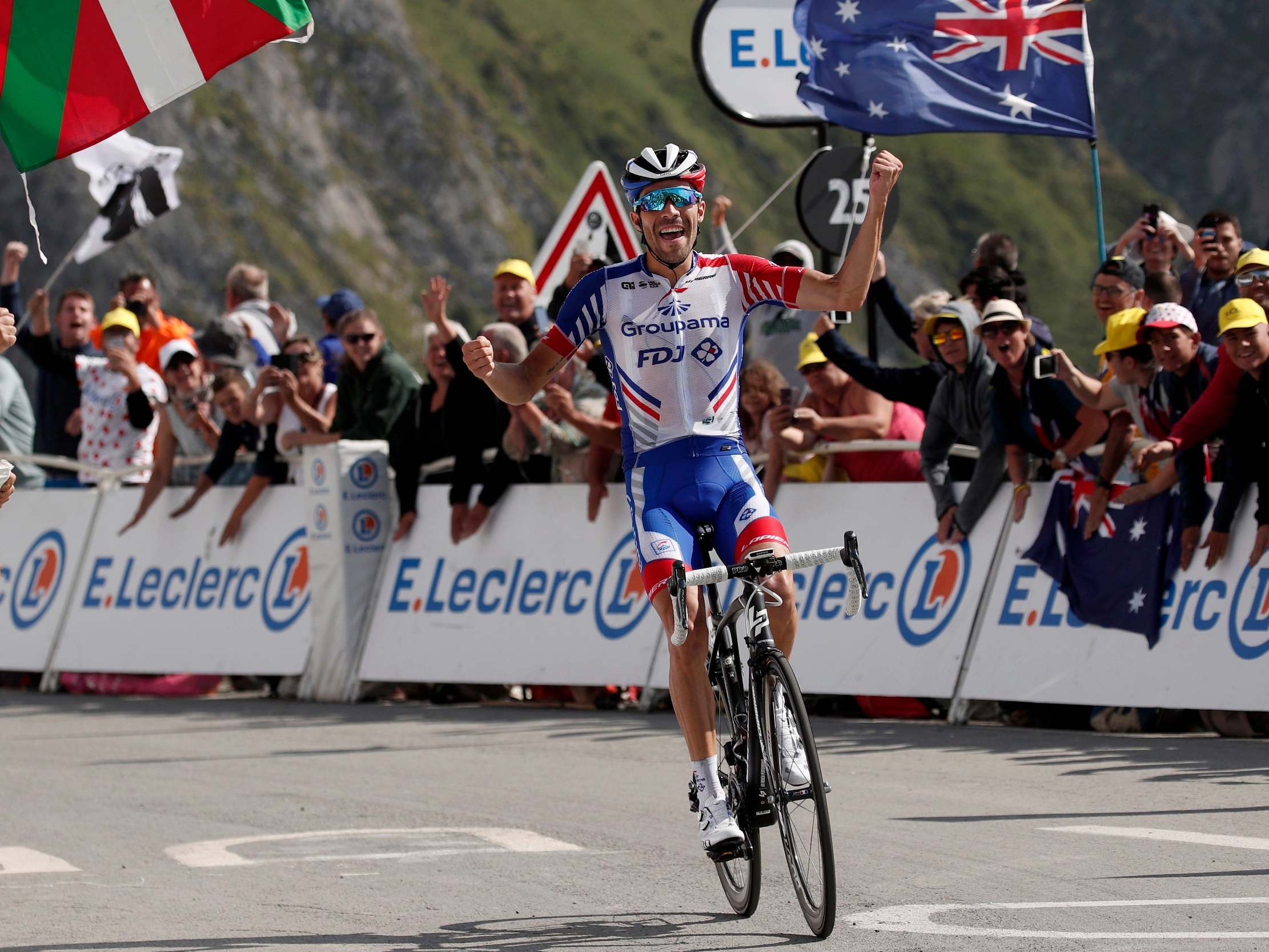 Thibaut Pinot crosses the line to win stage 14 of the Tour de France