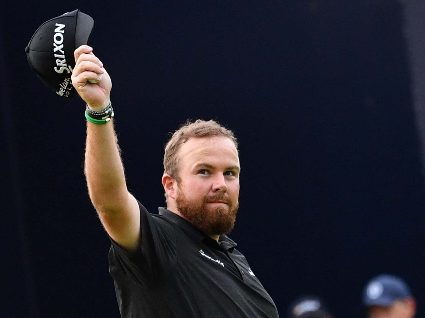 Shane Lowry celebrates his course record after an eight-under-par 63
