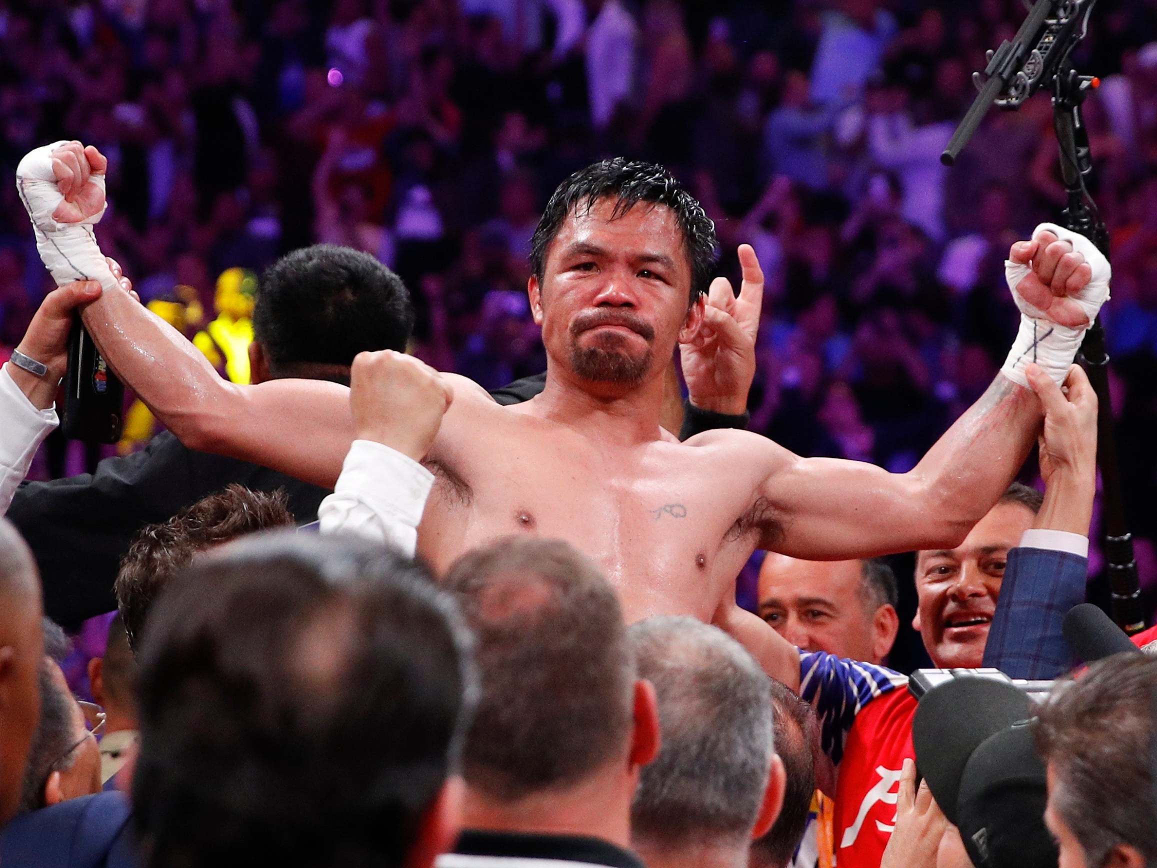 Pacquiao celebrates his victory over Thurman