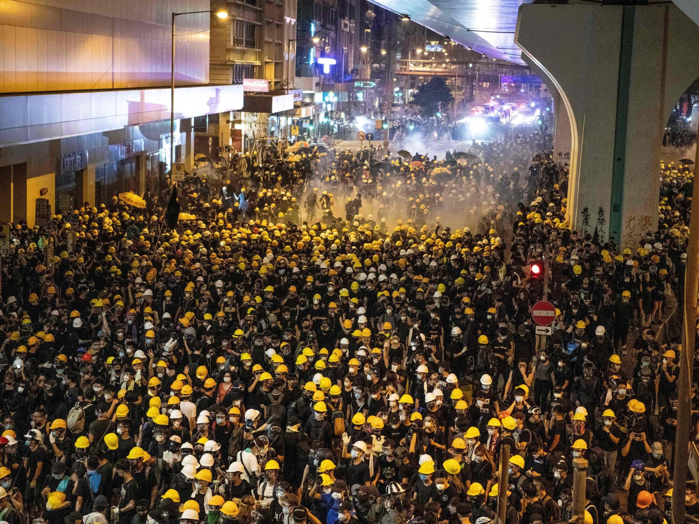 Police fire tear gas on protesters to disperse them after the march (LAUREL CHOR/AFP/Getty)