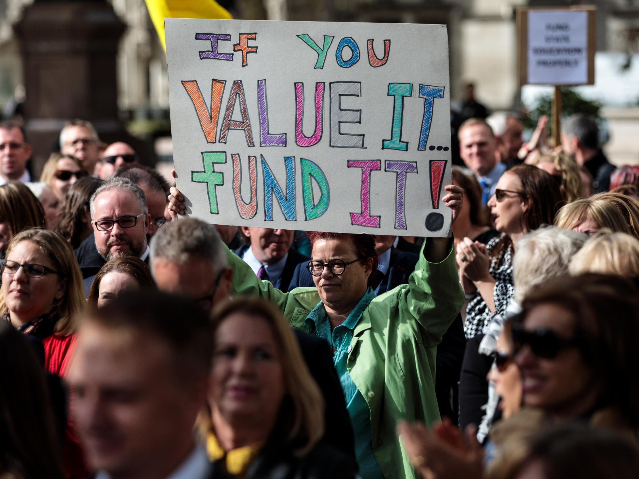 Hundreds of headteachers march to Downing Street in September last year to protest against government cuts to school funding (Getty)